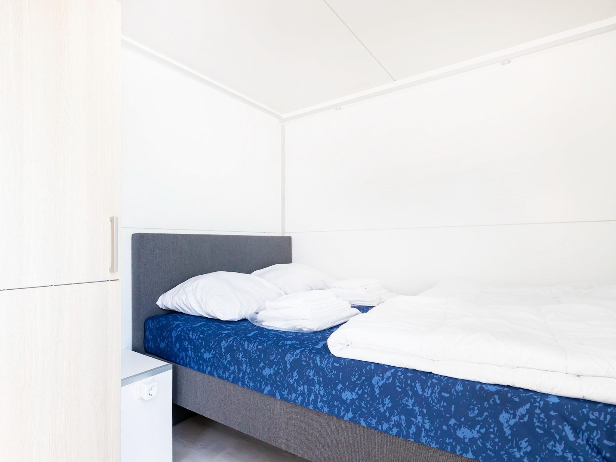 Een slaapkamer van Havenlodge with roof terrace and balcony (4 pers) in Amsterdam in Amsterdam