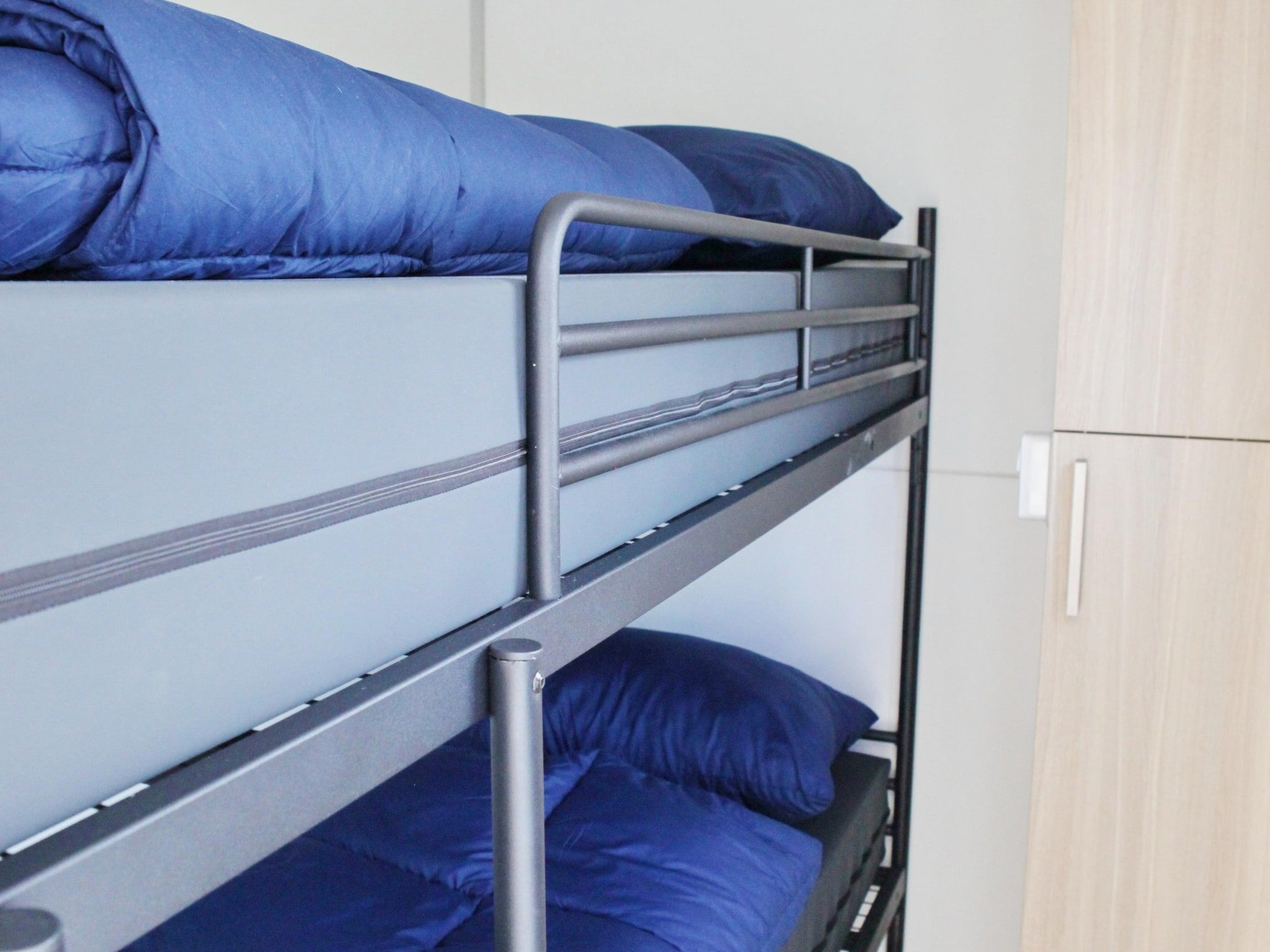 Een slaapkamer van Havenlodge with roof terrace and balcony (4-6 pers) Lelystad in Lelystad