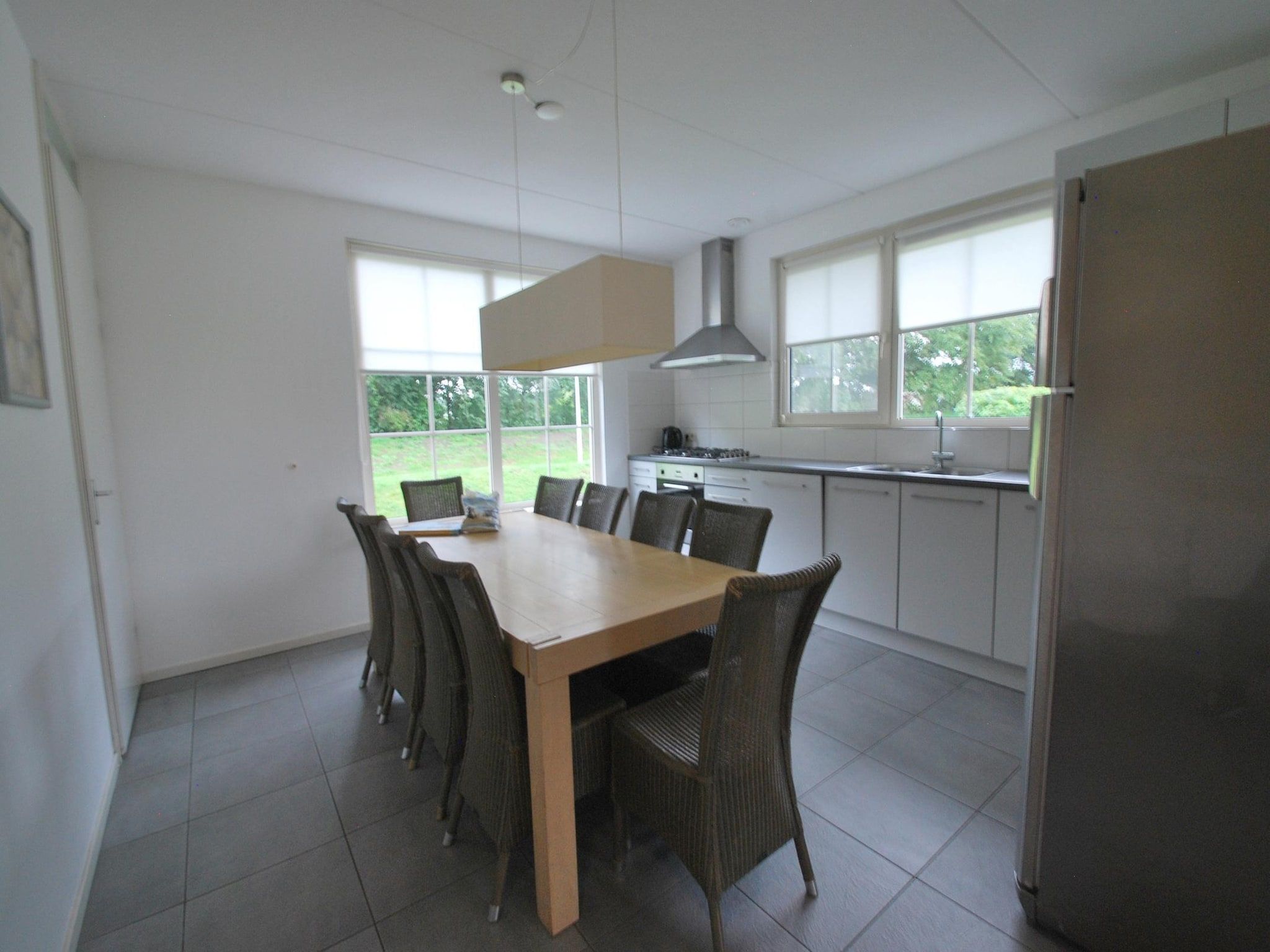 De eetkamer van Beach Villa Royale Classic with Sauna - 10 persons in Makkum