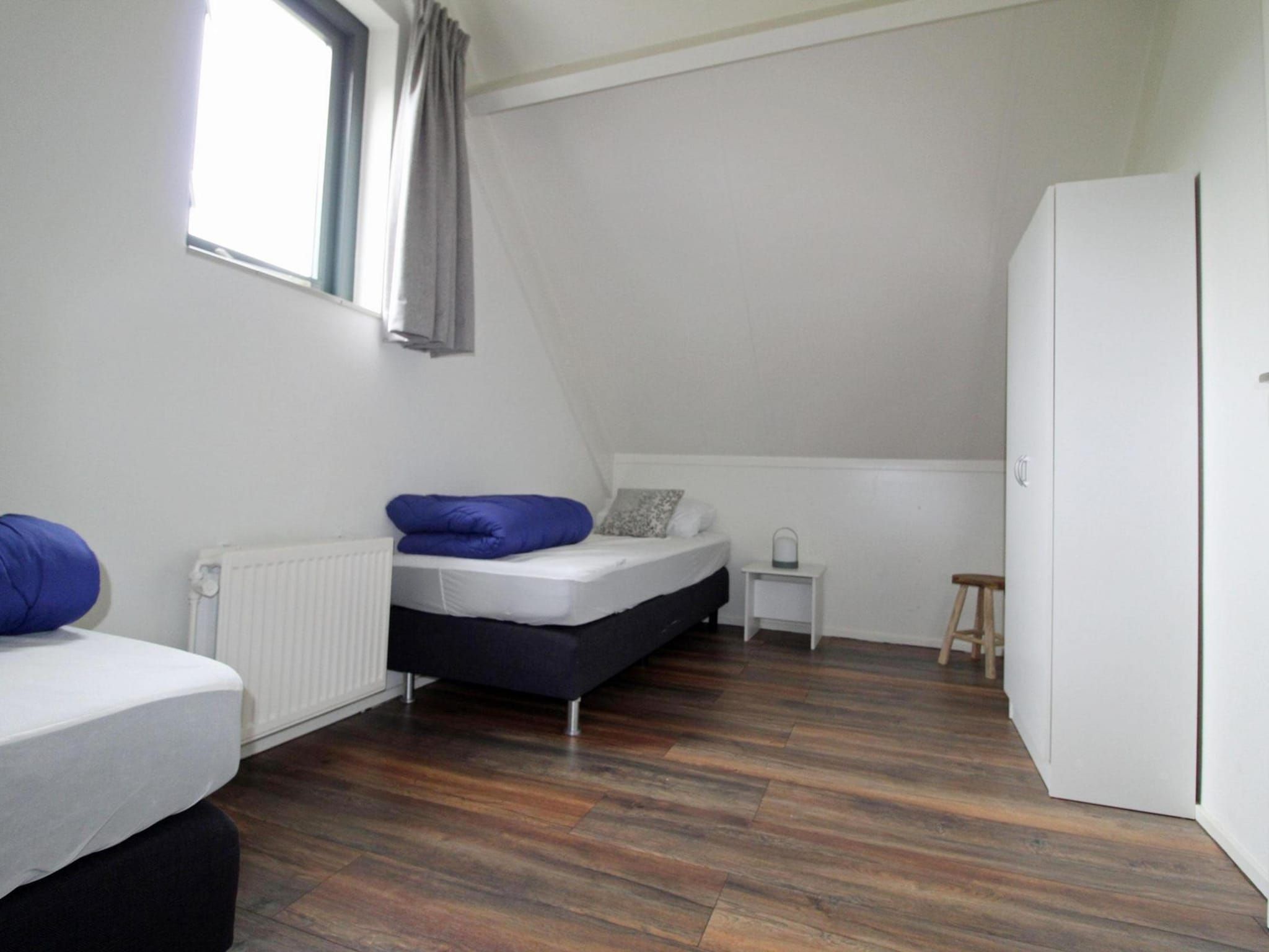 Een slaapkamer van 6 - Persons Bungalow La Moufflon in Ewijk
