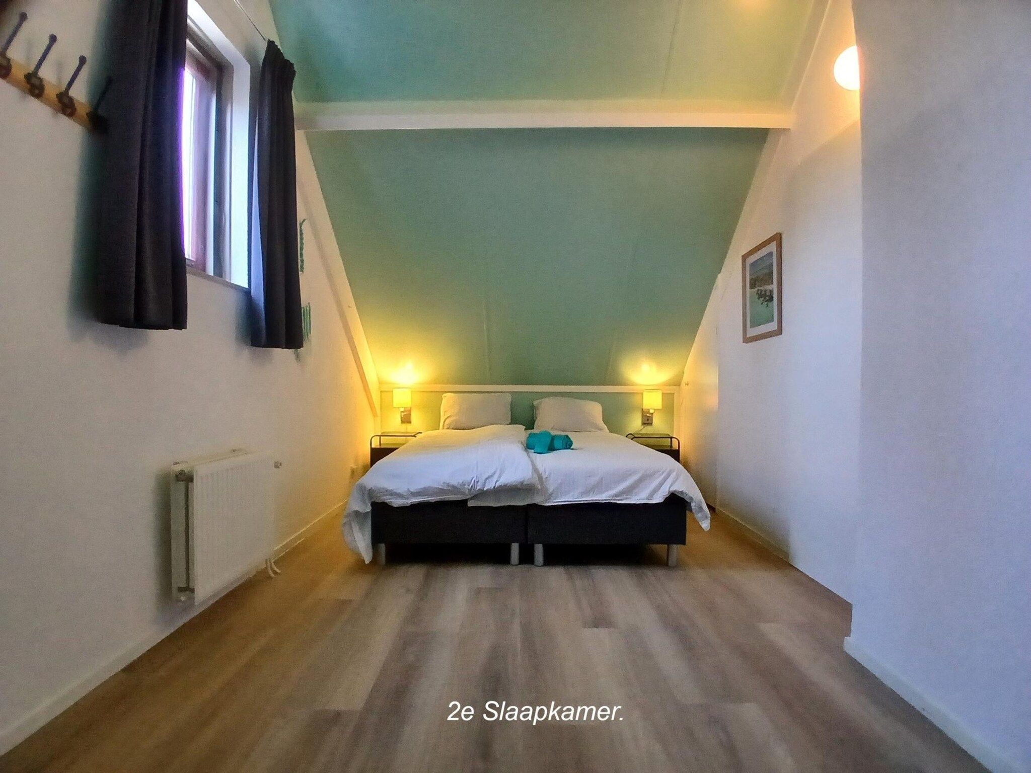 Een slaapkamer van 6 - Persons La Luna in Ewijk