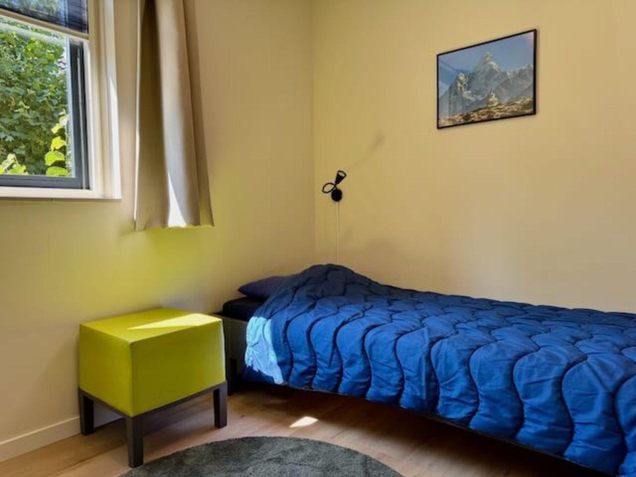 Een slaapkamer van 6 - Persons Forest VIP Bungalow (copy) in Ewijk