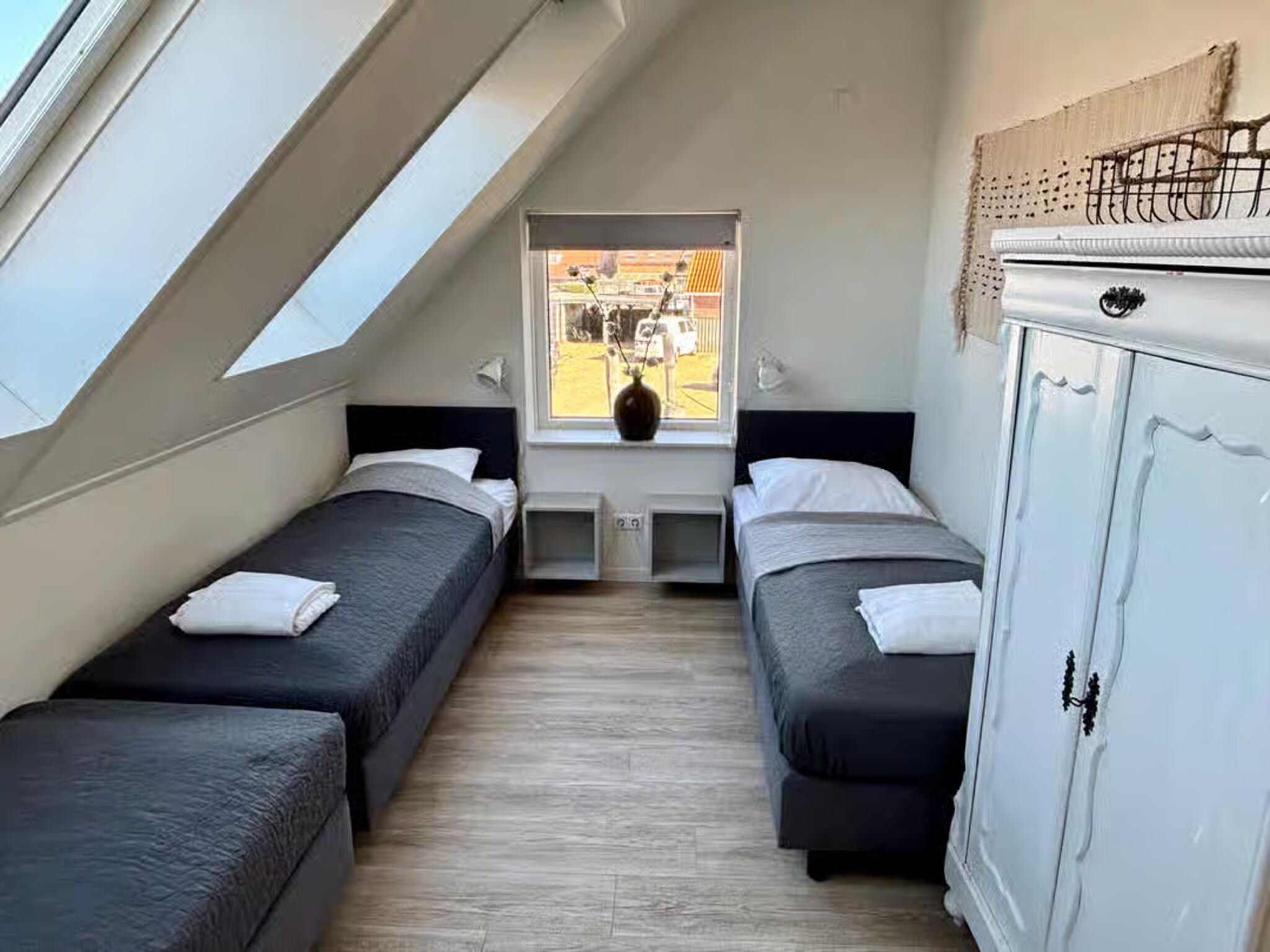 Een slaapkamer van Plein 40 Lodge 5 in Zoutelande