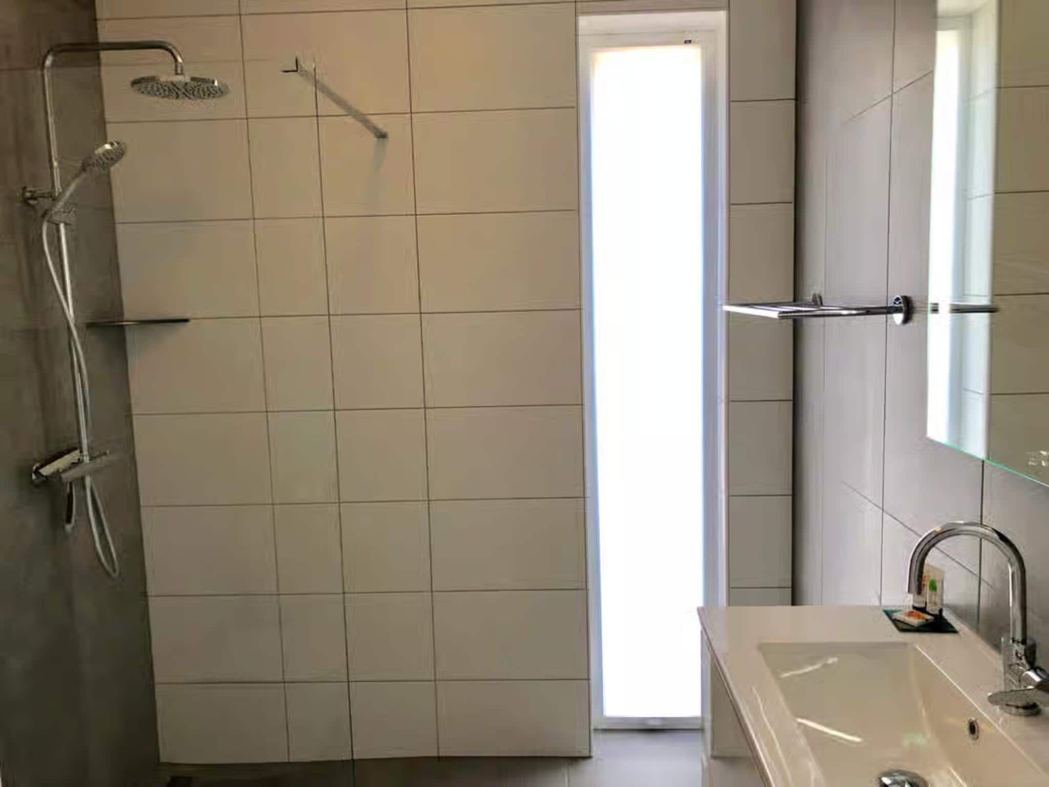 De badkamer van Plein 40 Lodge 6 in Zoutelande