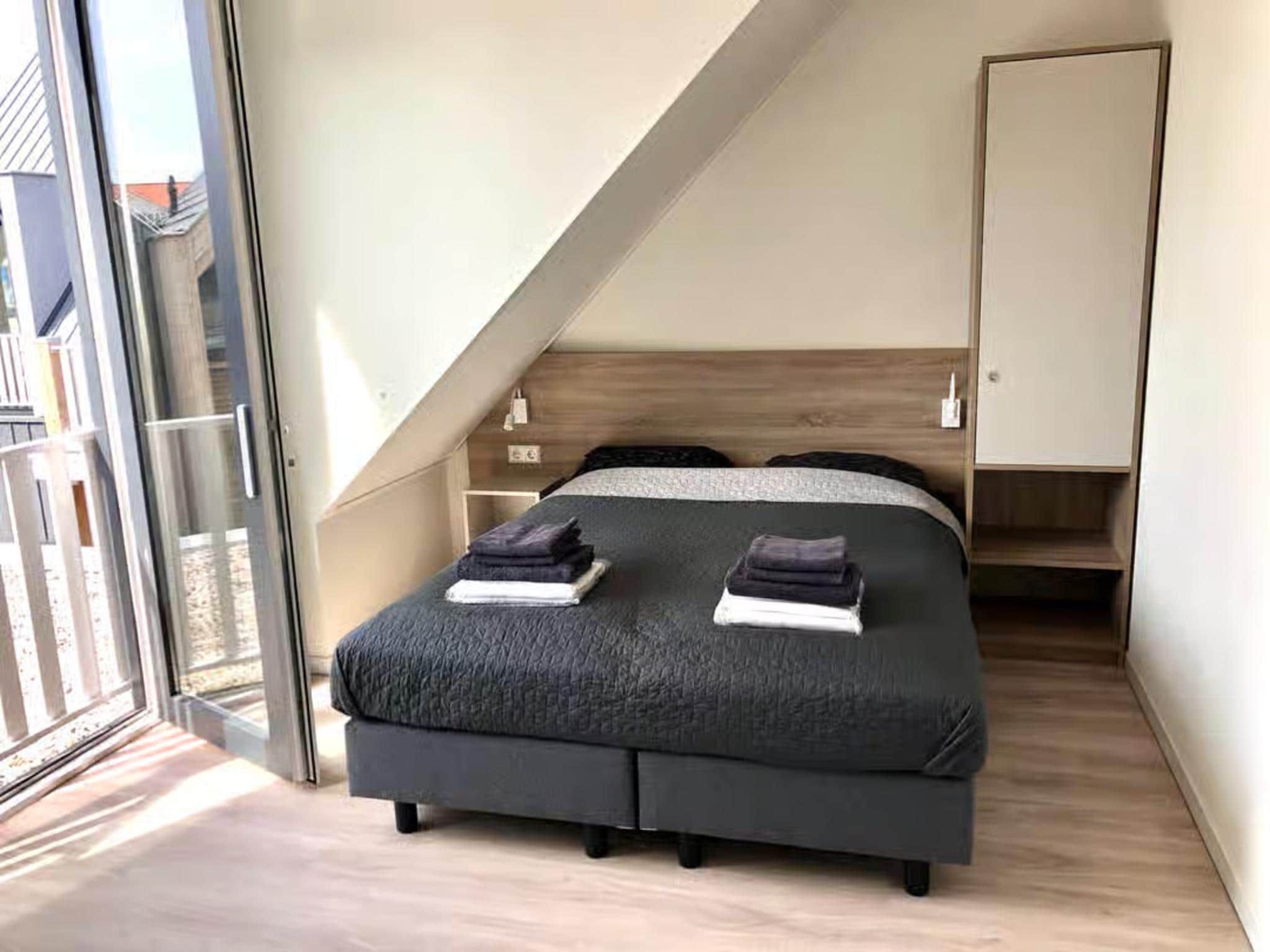 Een slaapkamer van Plein 40 Lodge 6 in Zoutelande