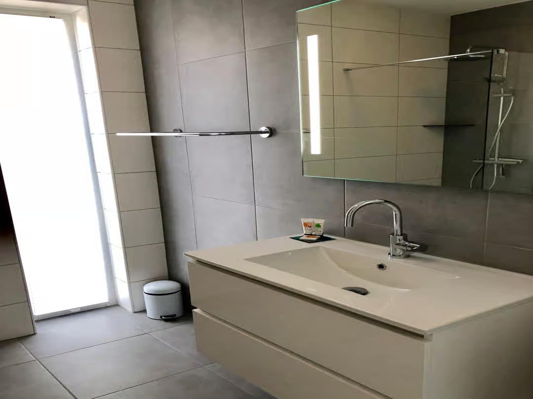 De badkamer van Plein 40 Lodge 6 in Zoutelande