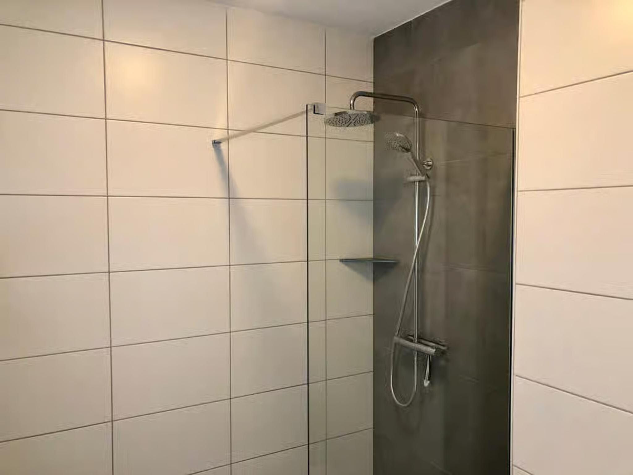 De badkamer van Plein 40 Lodge 7 in Zoutelande