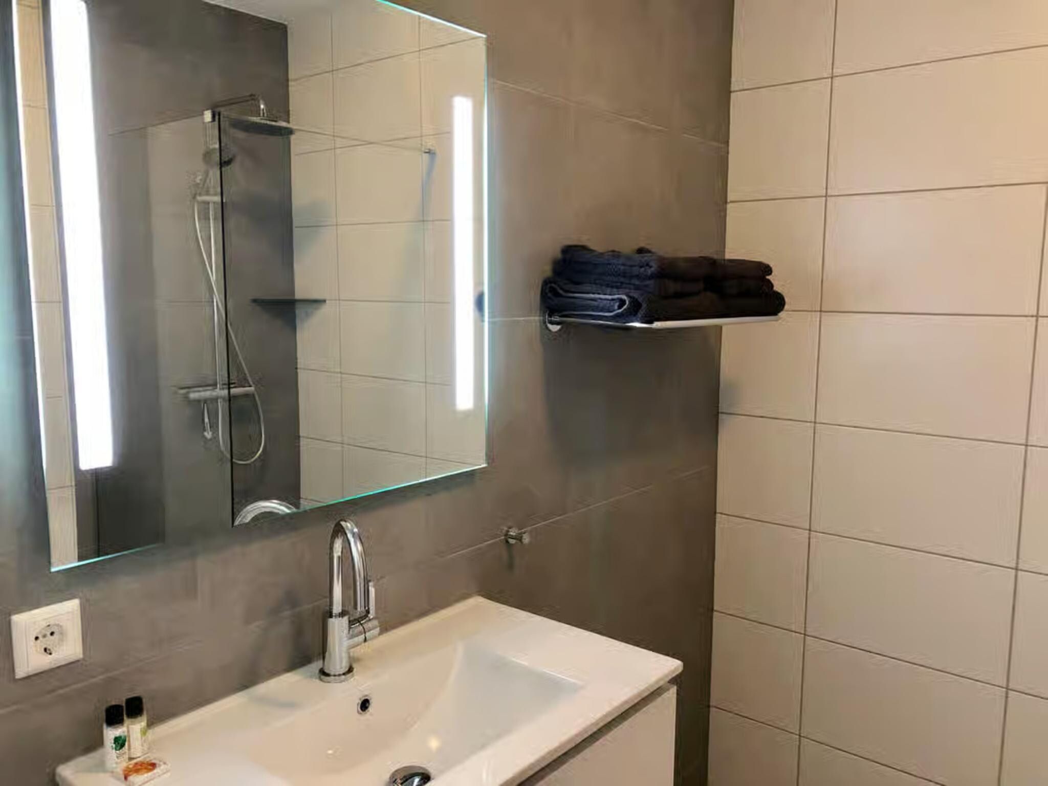 De badkamer van Plein 40 Lodge 7 in Zoutelande