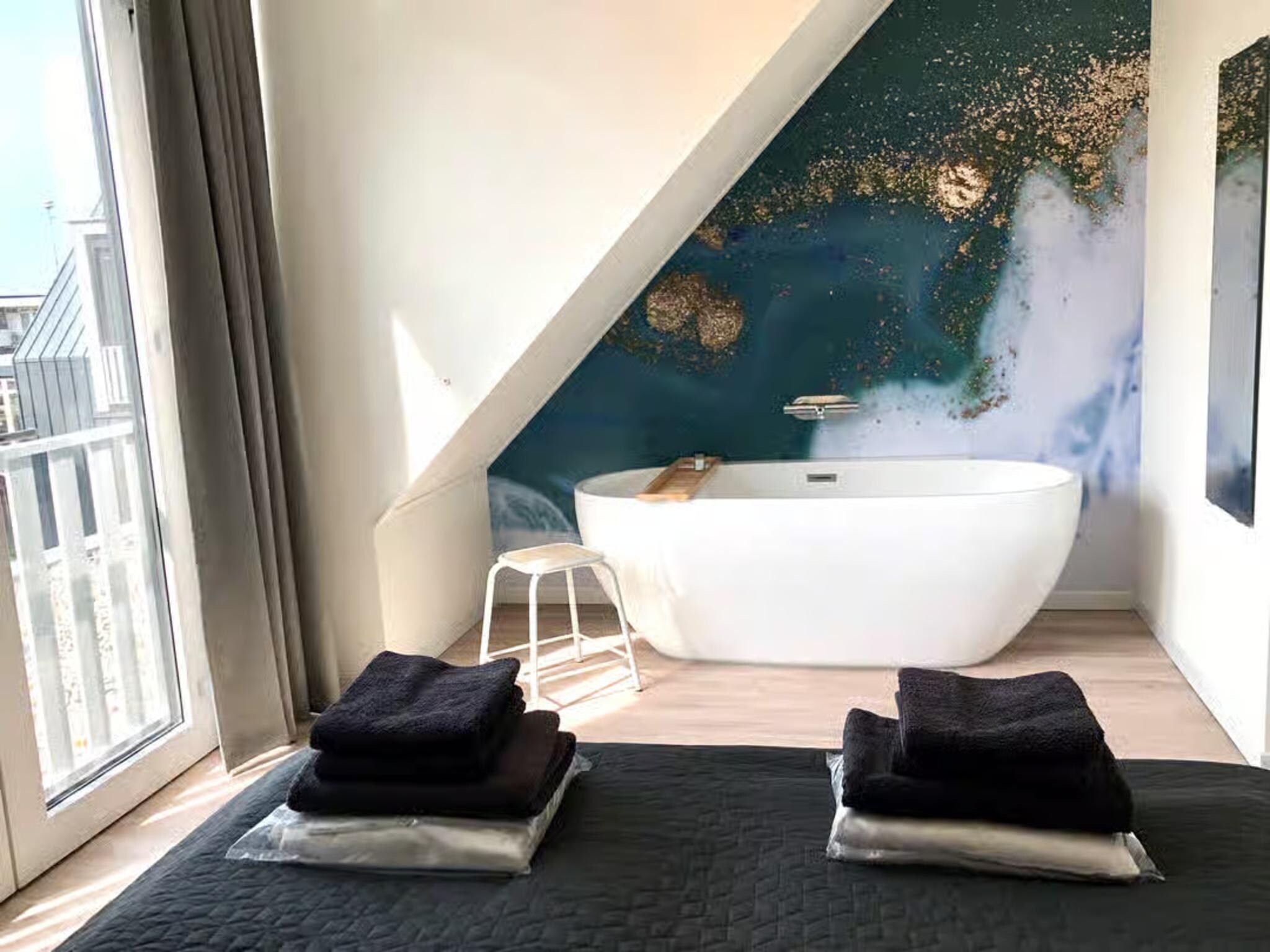 Een slaapkamer van Plein 40 Lodge 7 in Zoutelande