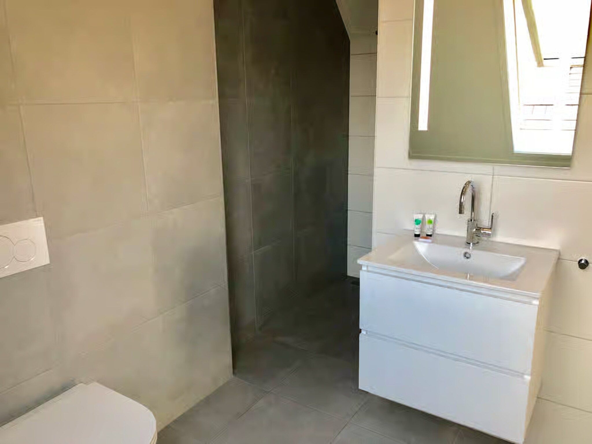 De badkamer van Plein 40 Lodge 20 in Zoutelande