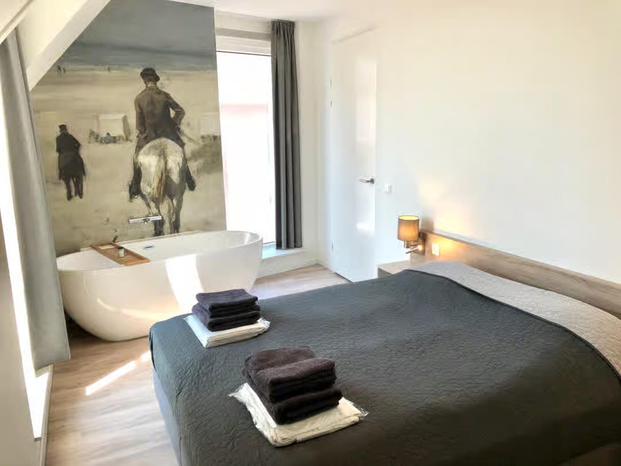 Een slaapkamer van Plein 40 Lodge 20 in Zoutelande