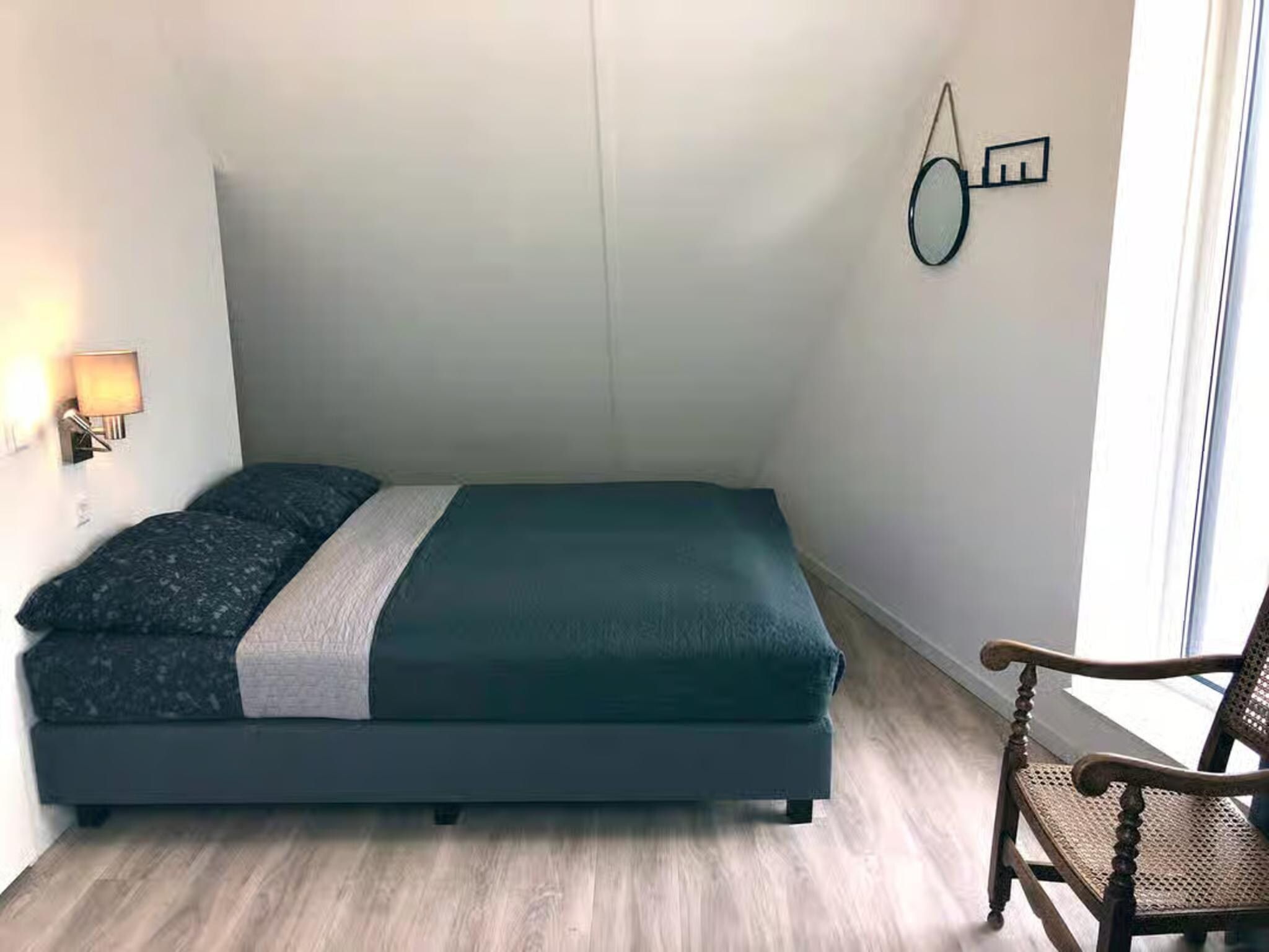 Een slaapkamer van Plein 40 Lodge 20 in Zoutelande