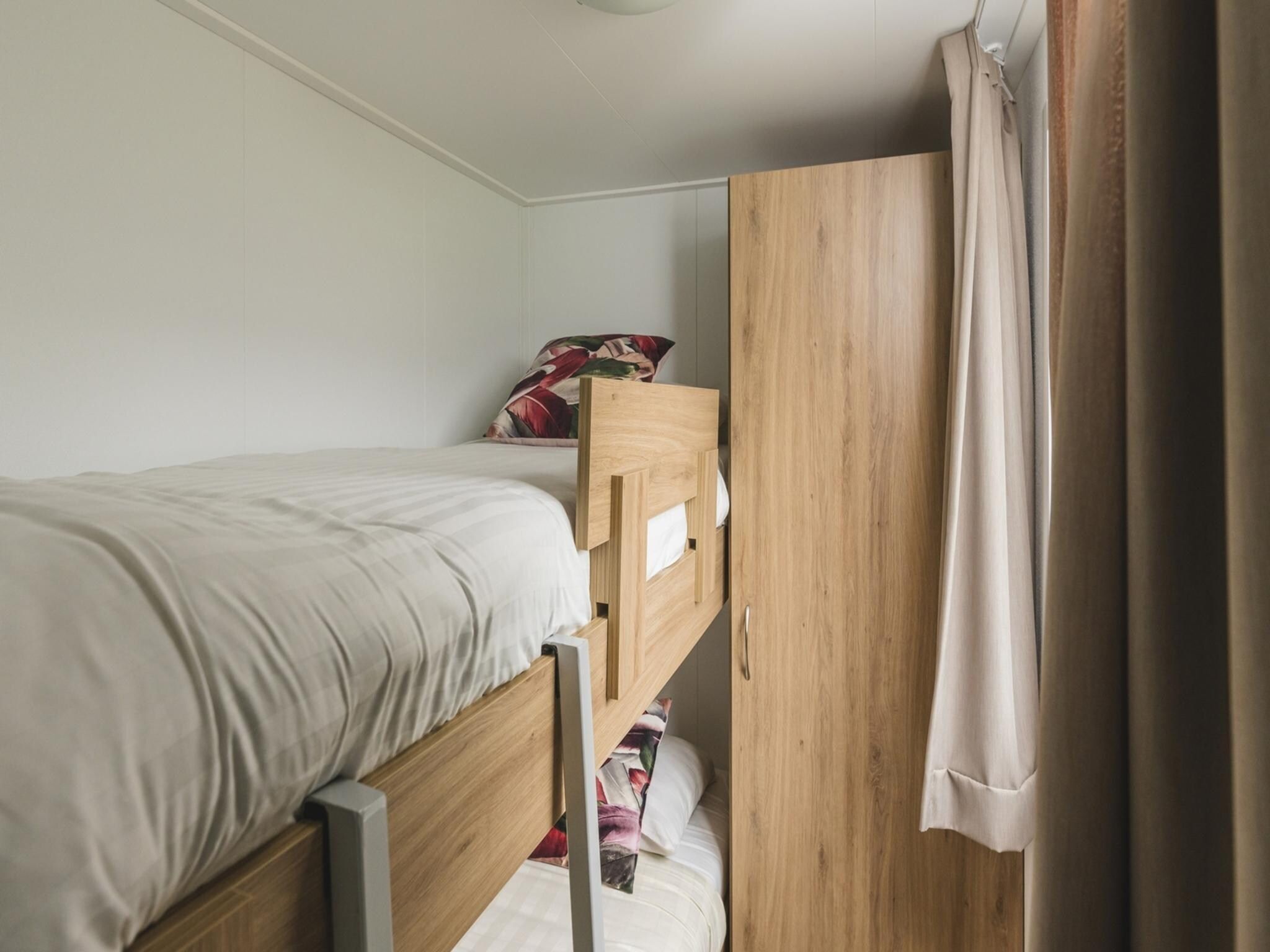 Een slaapkamer van Forest lodge | 6 people in Rijssen