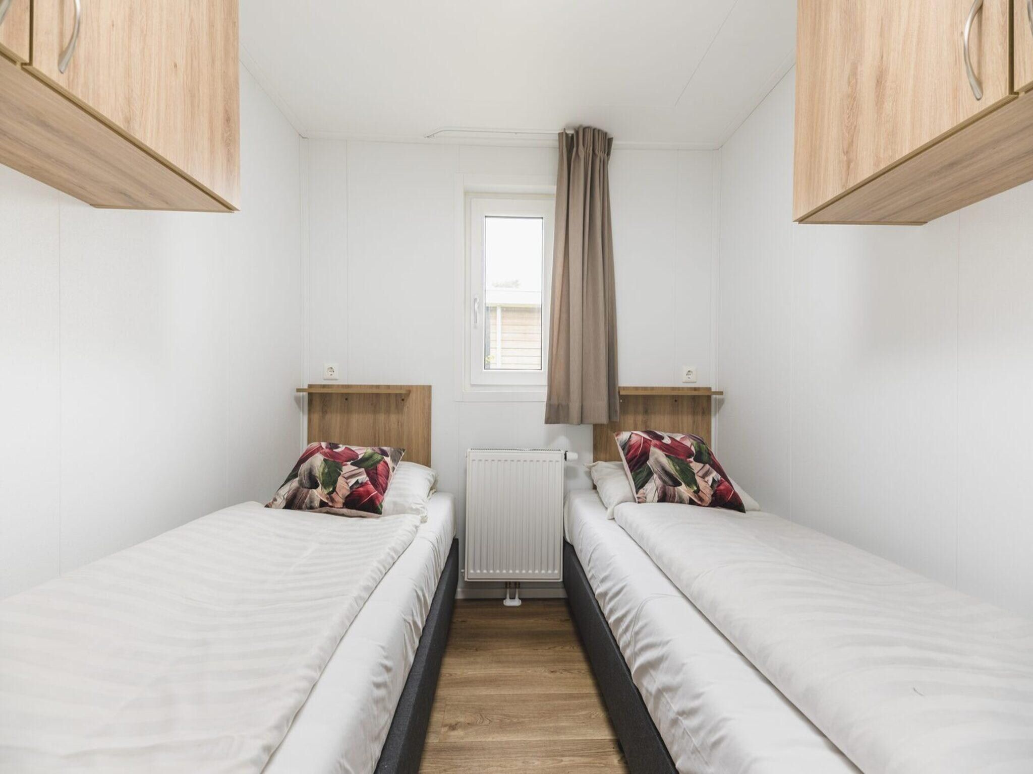 Een slaapkamer van Forest lodge | 6 people in Rijssen