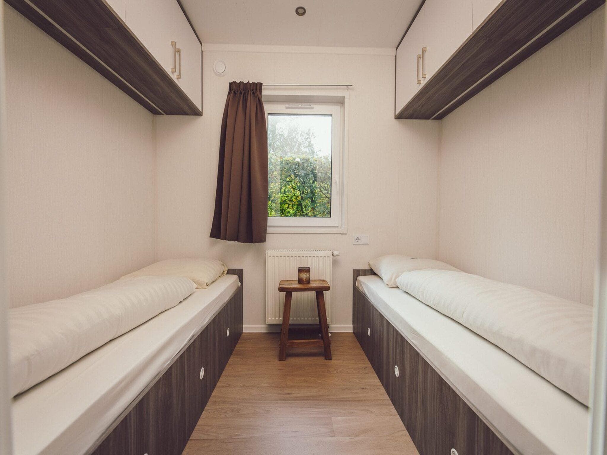 Een slaapkamer van Tiny Cabin with Hottub I 4 people in Rijssen
