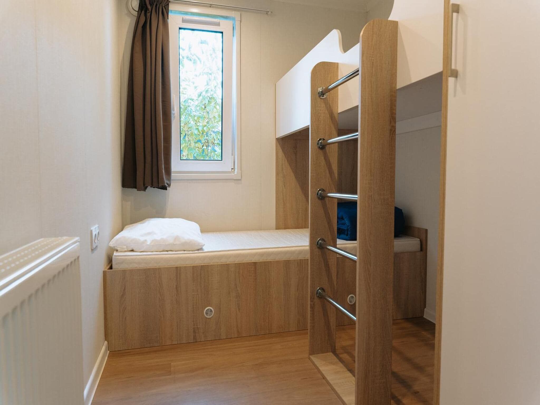 Een slaapkamer van Tiny Cabin with Hottub I 4 people in Rijssen