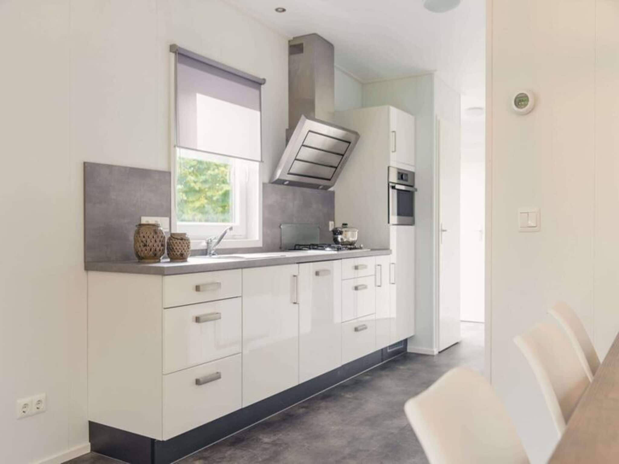 De keuken van Luxury lodge with private sauna | 6 people in Rijssen