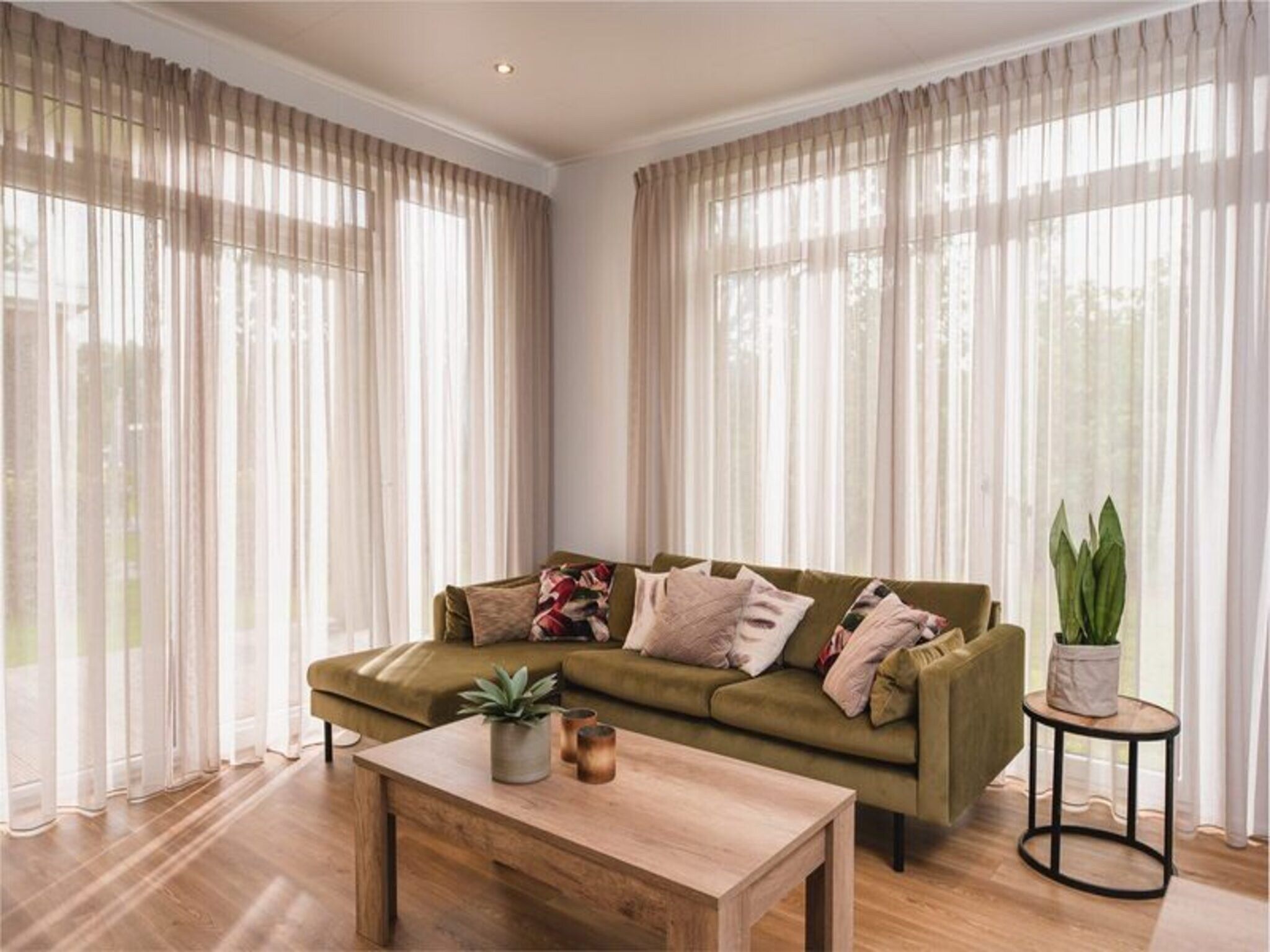 De woonkamer van Luxury lodge with private sauna | 6 people in Rijssen