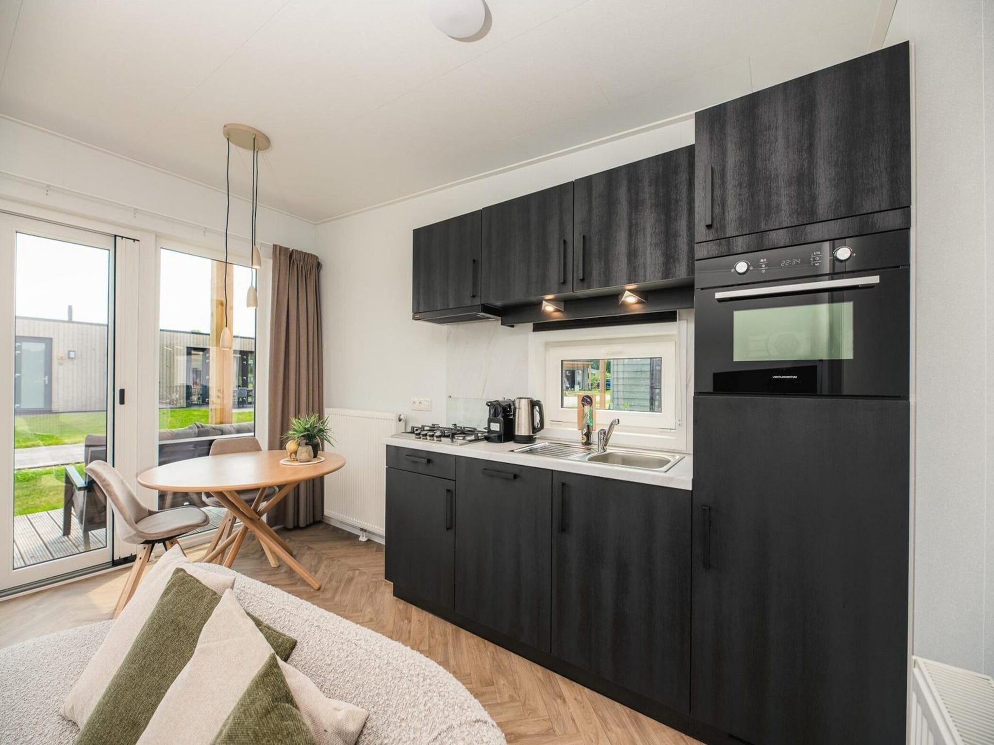 De keuken van Wellness Lodge | jacuzzi, sauna and sunshower | 2 persons in Rijssen
