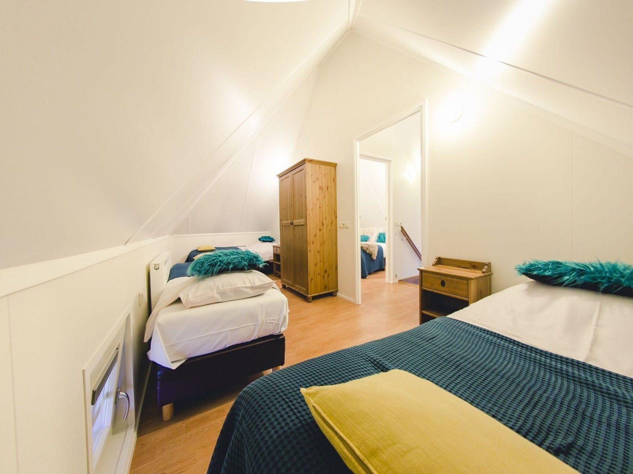 Een slaapkamer van Group accommodation (2x Reggehooiberg, with large backyard) I 10 people in Zuna