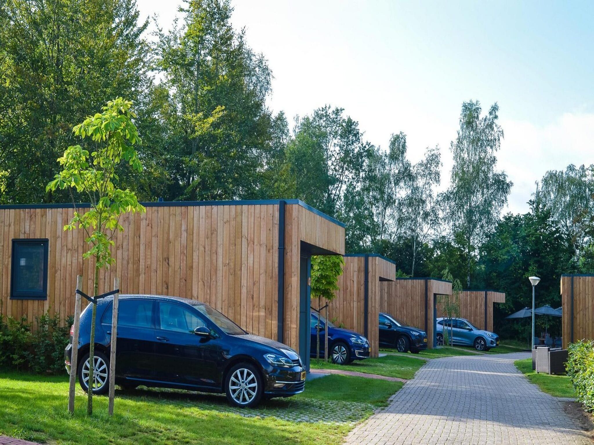 De buitenkant van Group accommodation (7x Happy Oak Lodge 28p) in Zuna