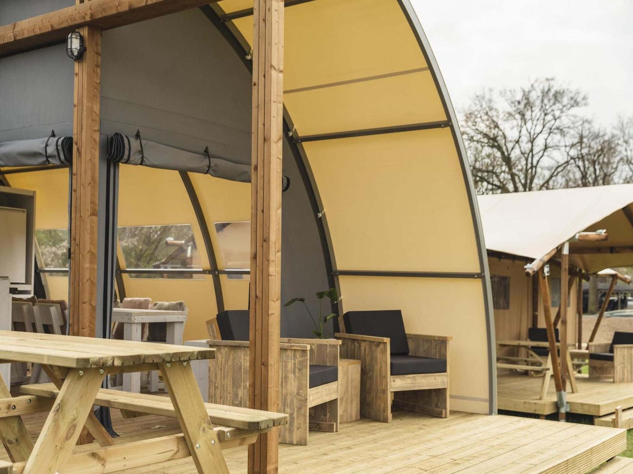Het terras van Group accommodation (6x luxury glamping tent) I 32 people in Zuna