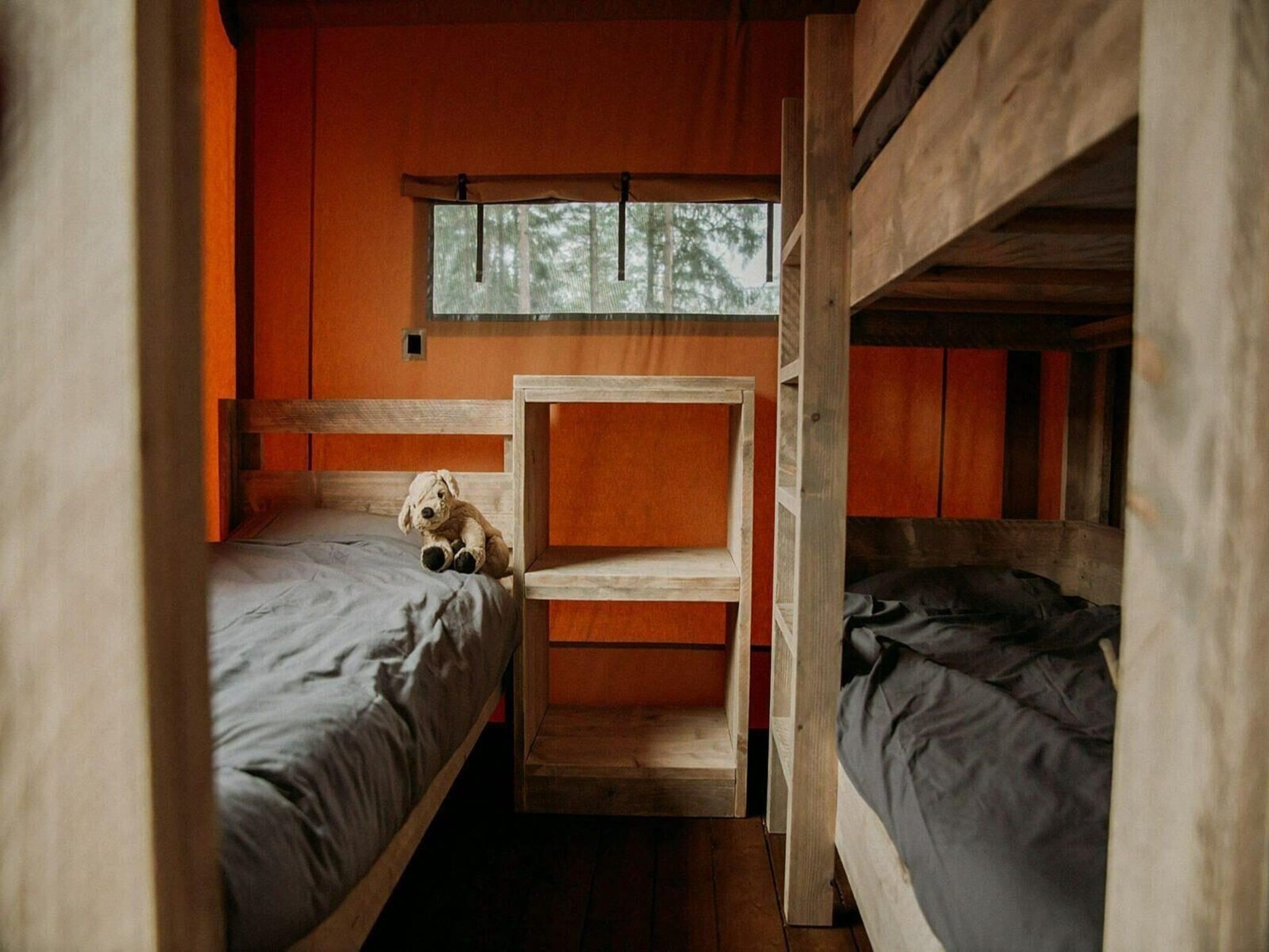 Een slaapkamer van Group accommodation (6x luxury glamping tent) I 32 people in Zuna