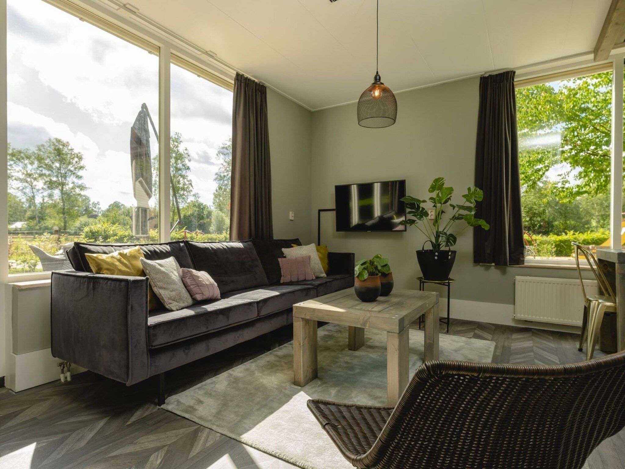 De woonkamer van Baby & children's bungalow 'Knights & Princesses' with sauna & bubble bath I sleep 5 in Zuna