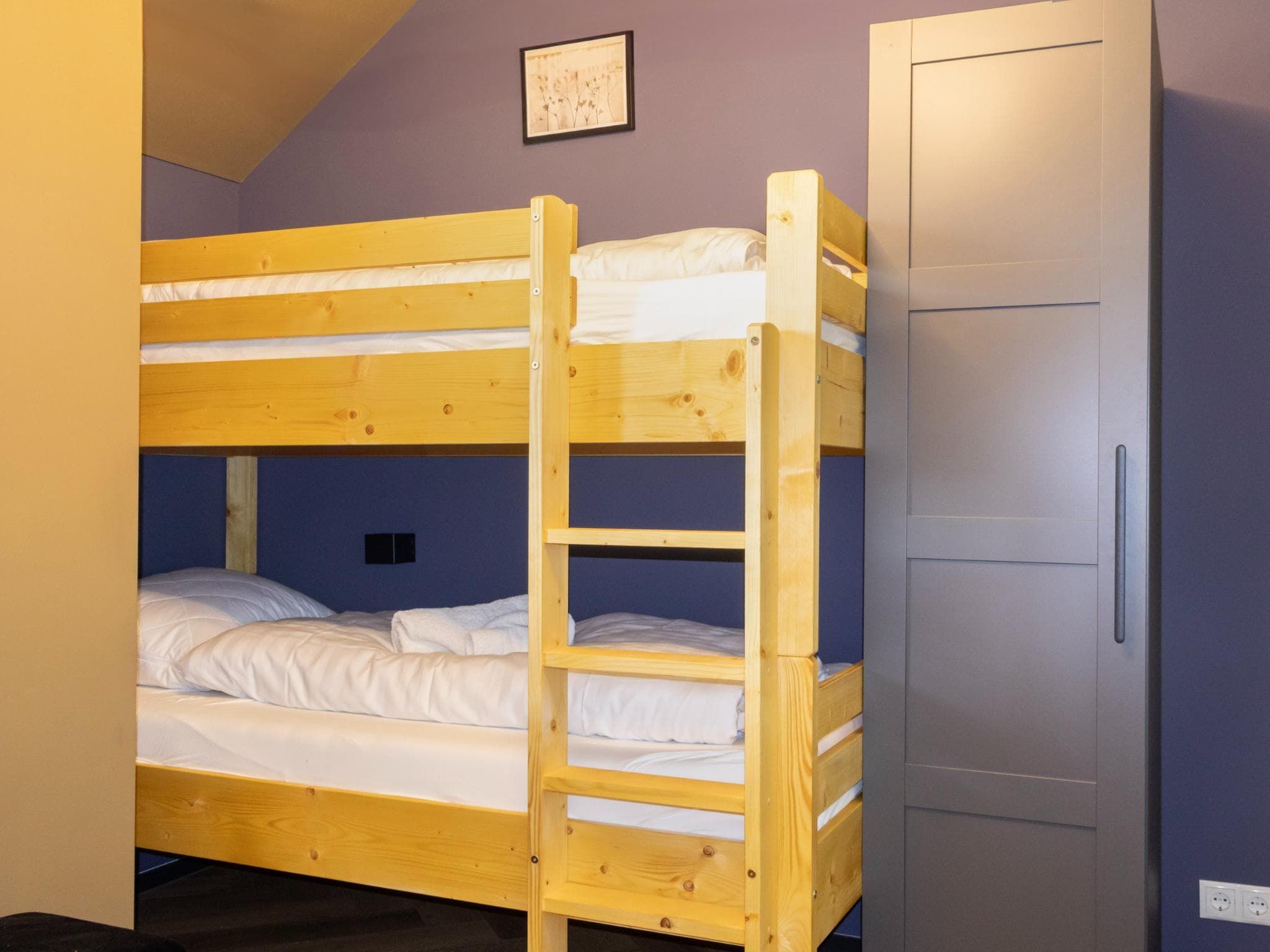 Een slaapkamer van Eindeloos Uitzicht in Kiel-Windeweer