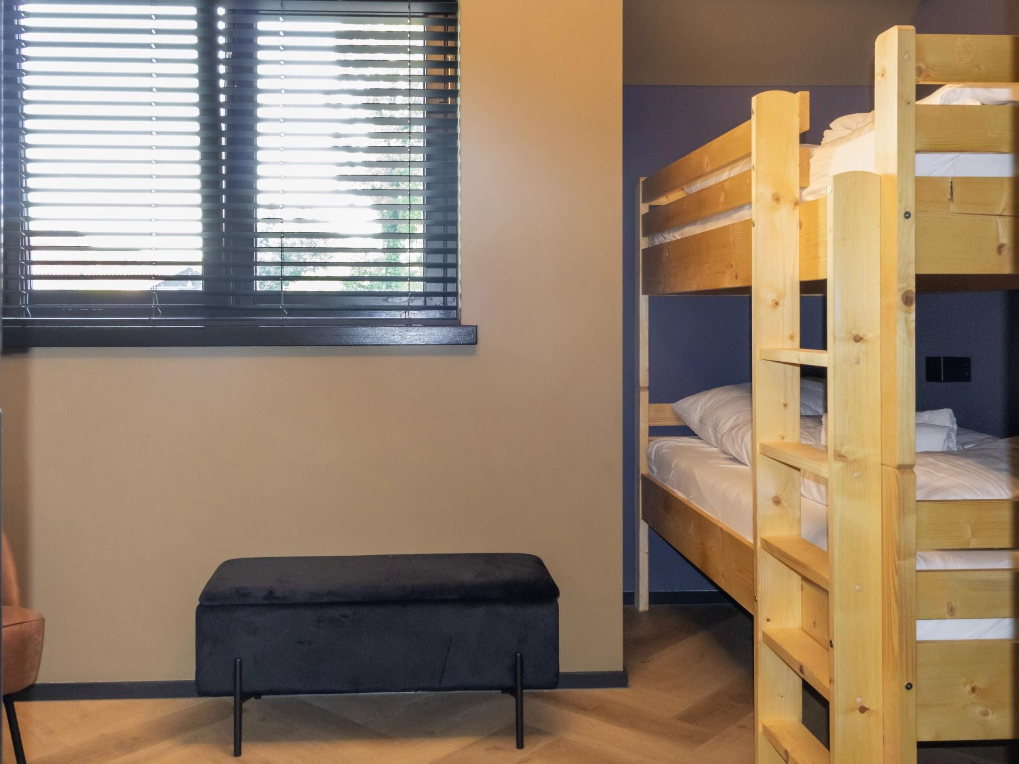 Een slaapkamer van Eindeloos Uitzicht in Kiel-Windeweer