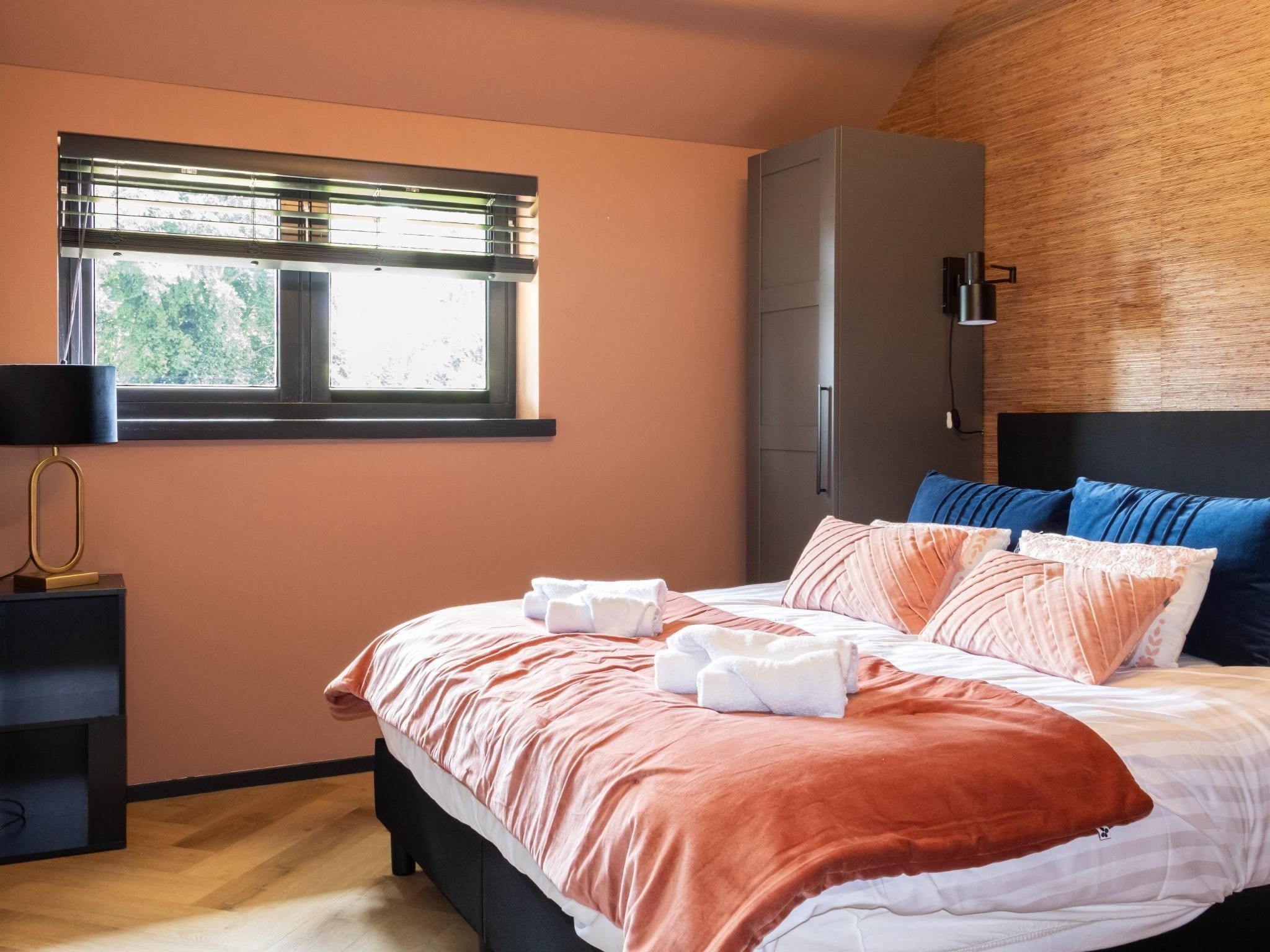 Een slaapkamer van Eindeloos Uitzicht in Kiel-Windeweer