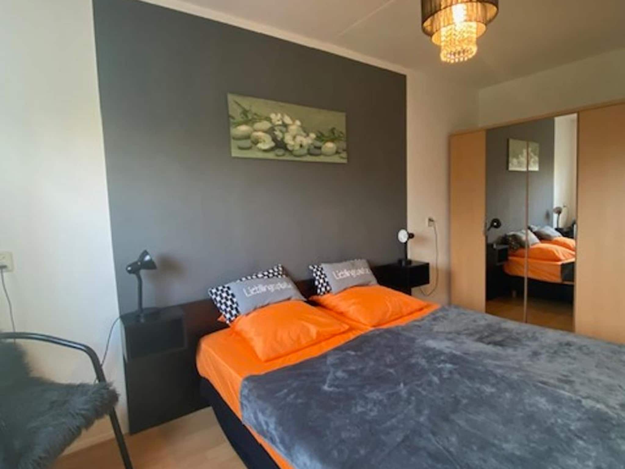 Een slaapkamer van Résidence Juliana 21 in Julianadorp aan Zee