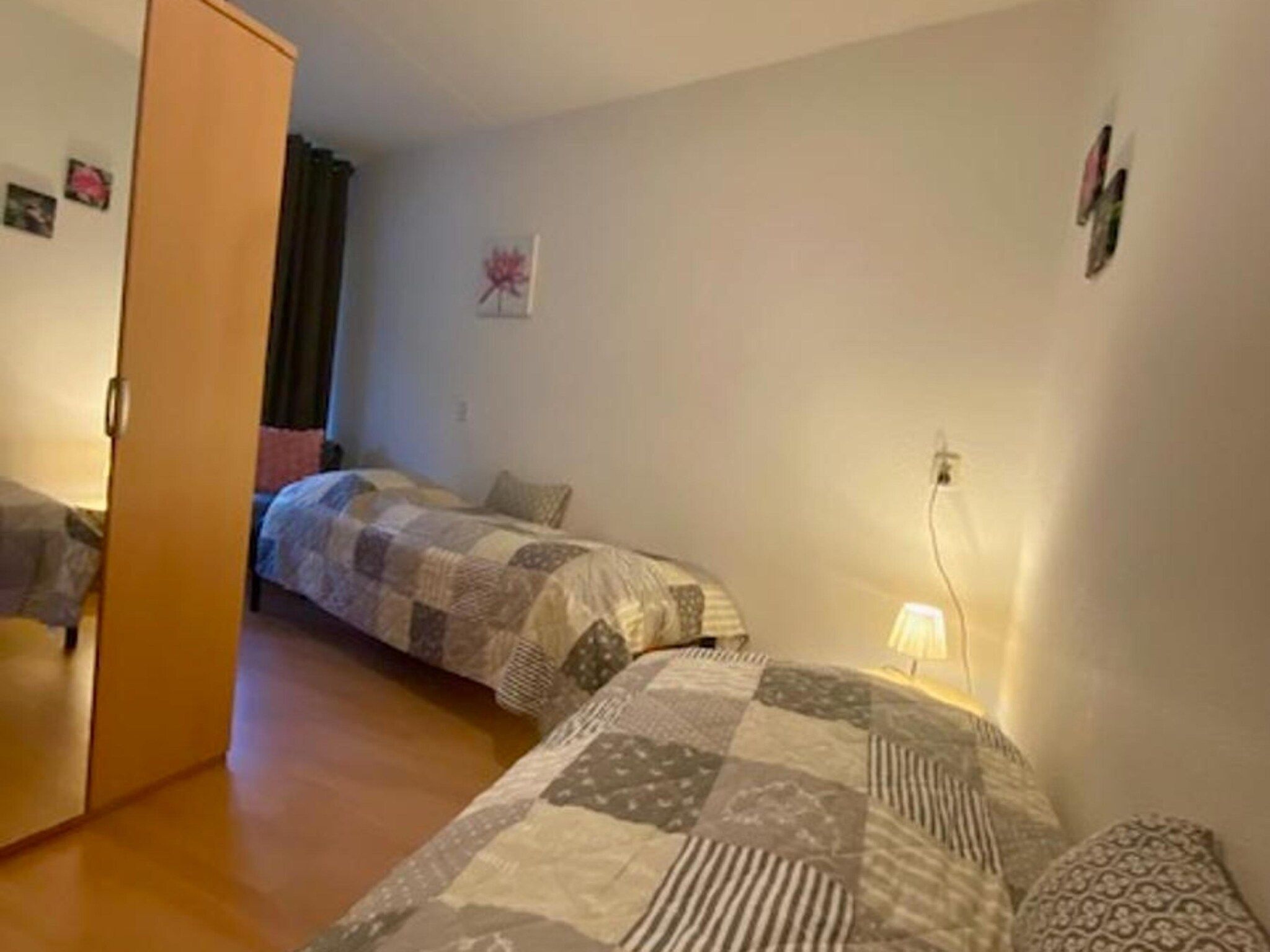 Een slaapkamer van Résidence Juliana 21 in Julianadorp aan Zee