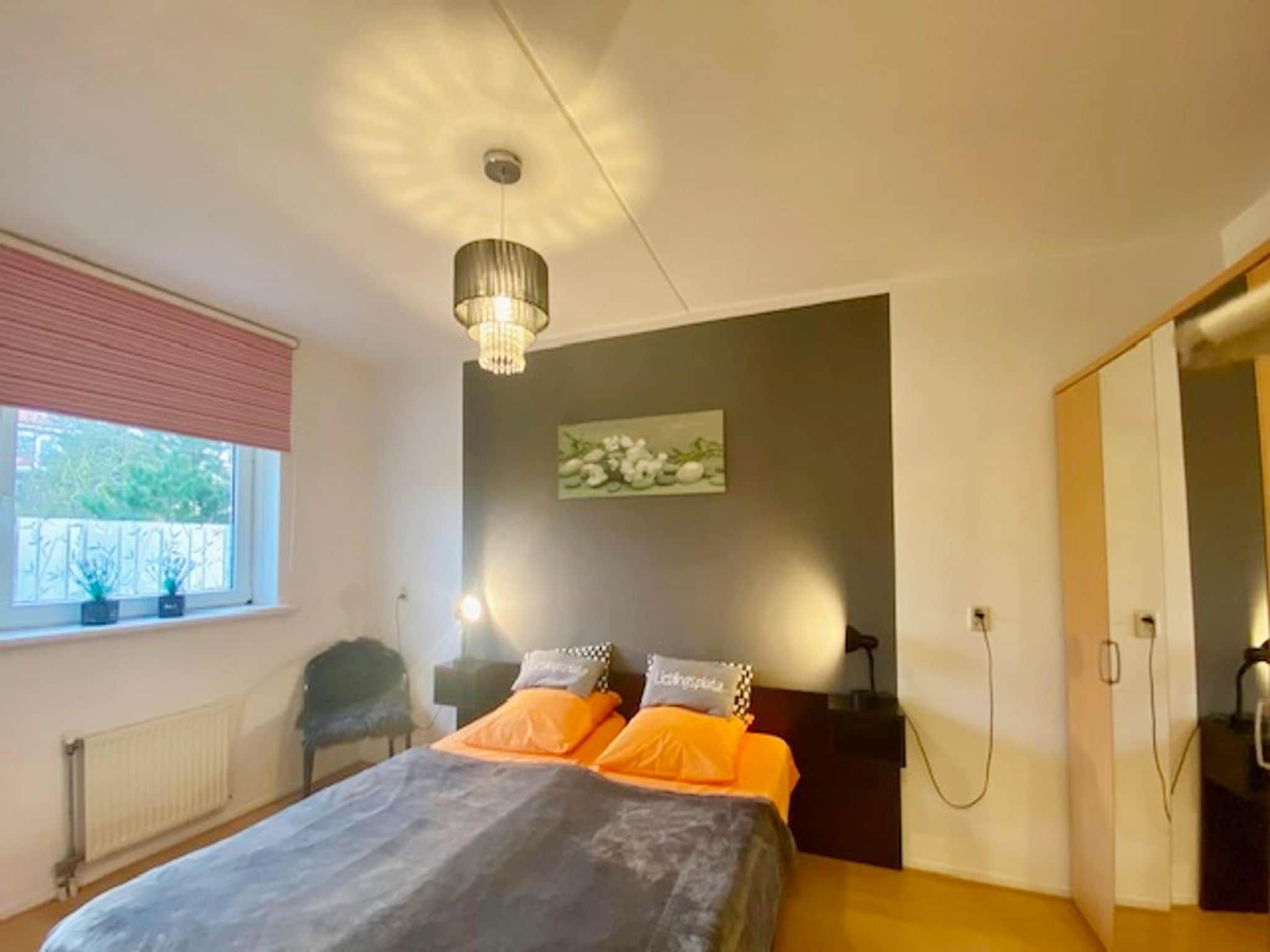 Een slaapkamer van Résidence Juliana 21 in Julianadorp aan Zee