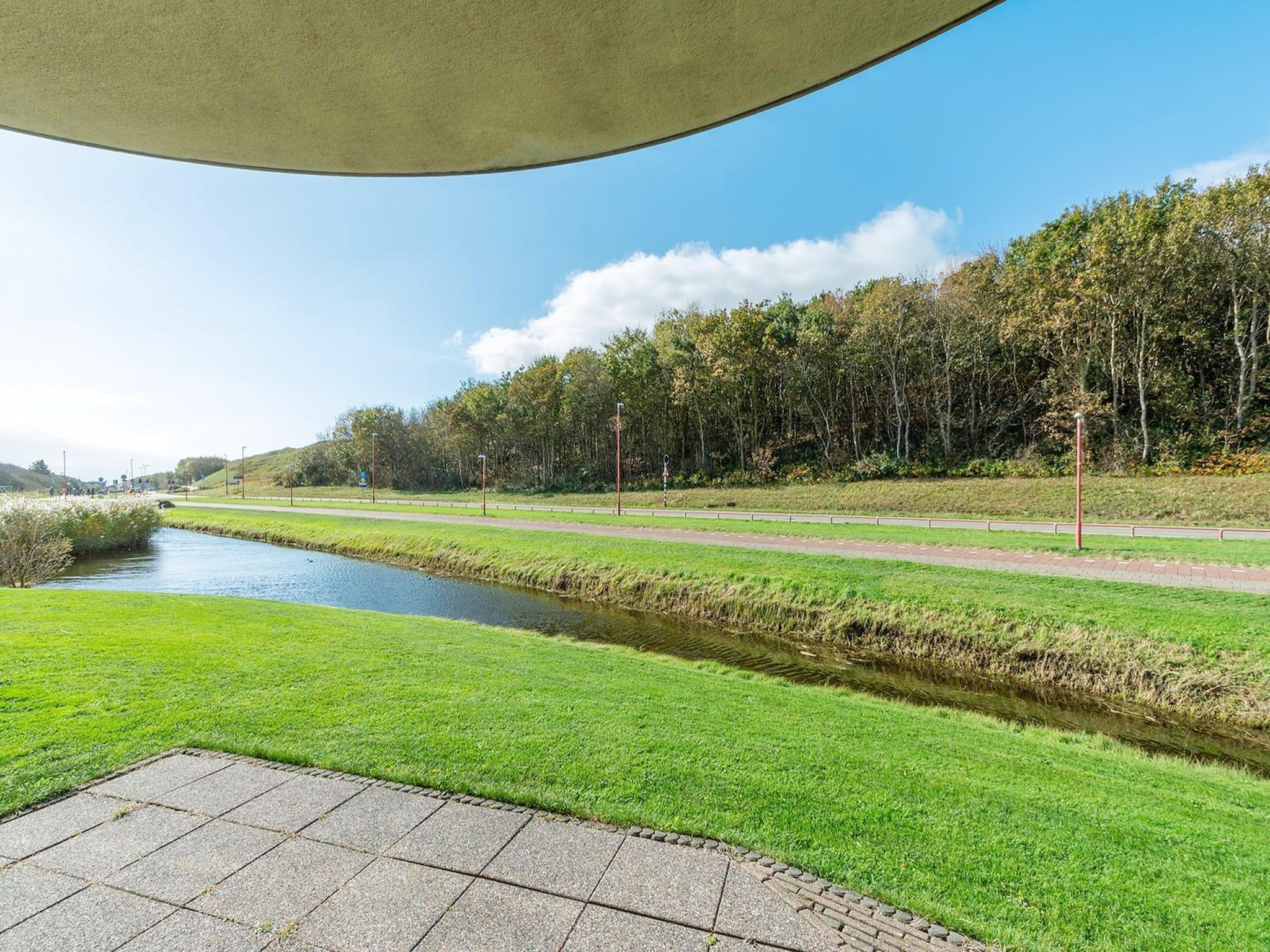 De tuin van Résidence Juliana 21 in Julianadorp aan Zee