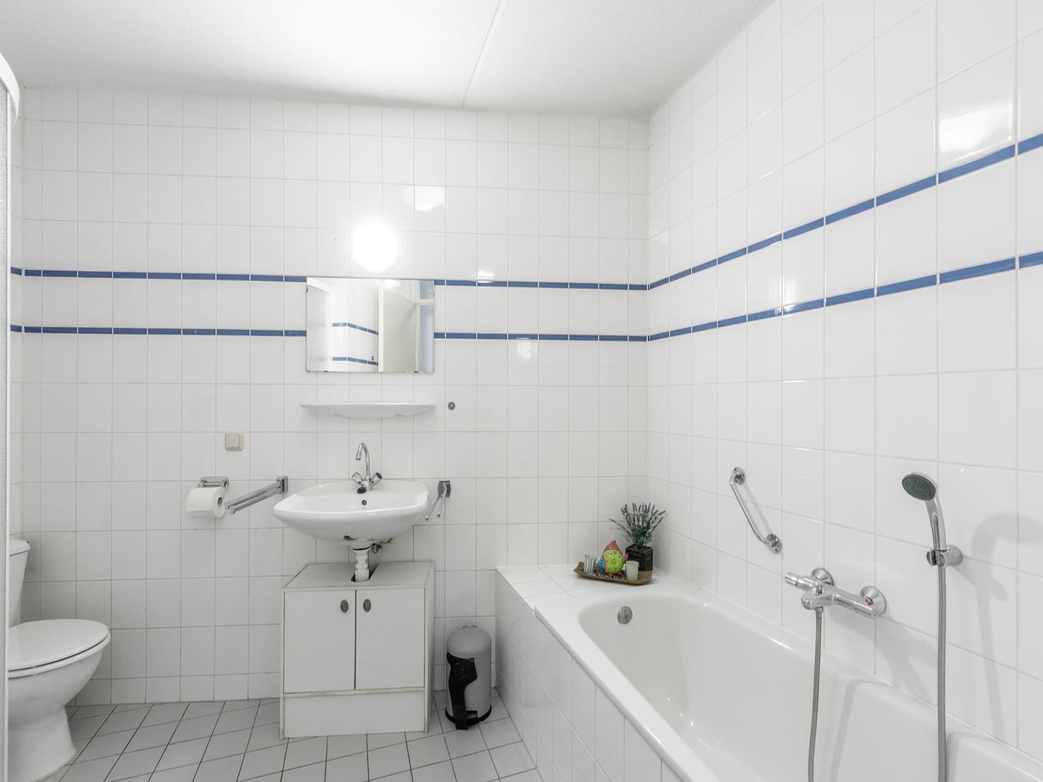 De badkamer van Résidence Juliana 21 in Julianadorp aan Zee