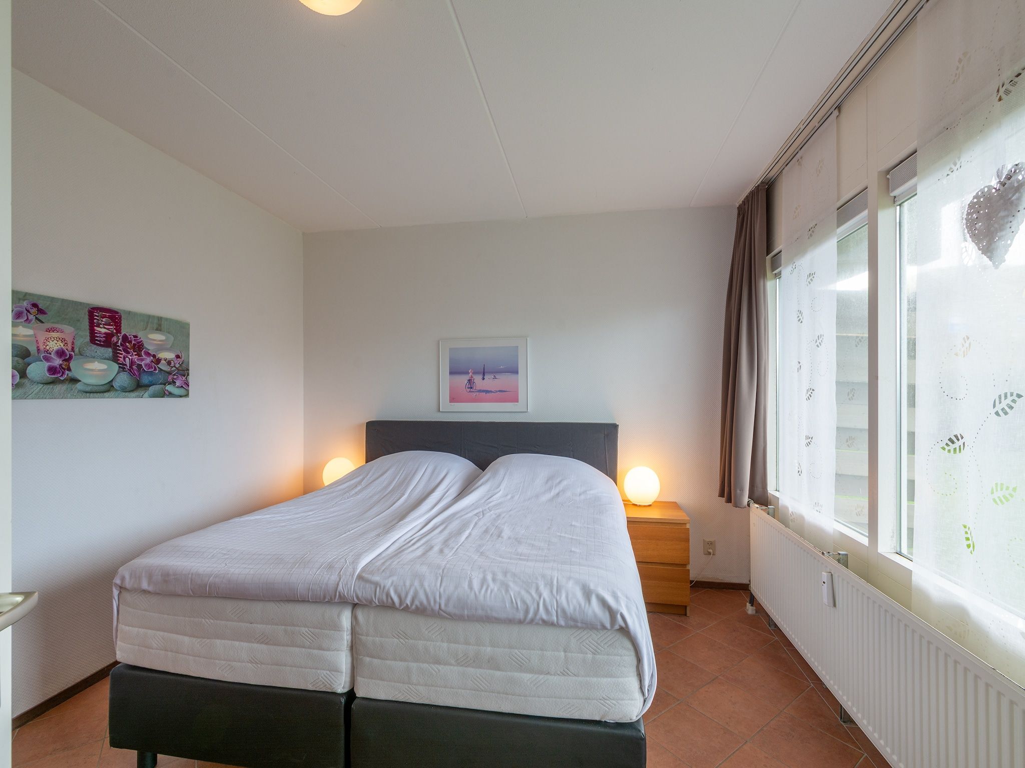 Een slaapkamer van Beach Appartement 04 in Callantsoog