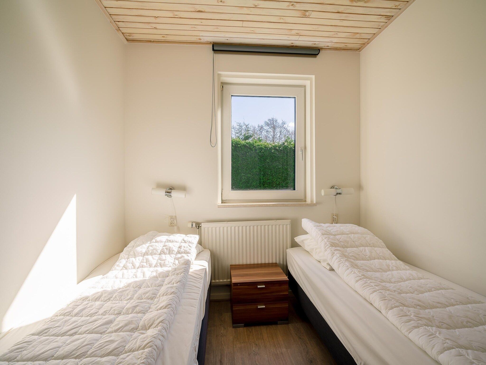 Een slaapkamer van Hoogelandt 90a in De Koog