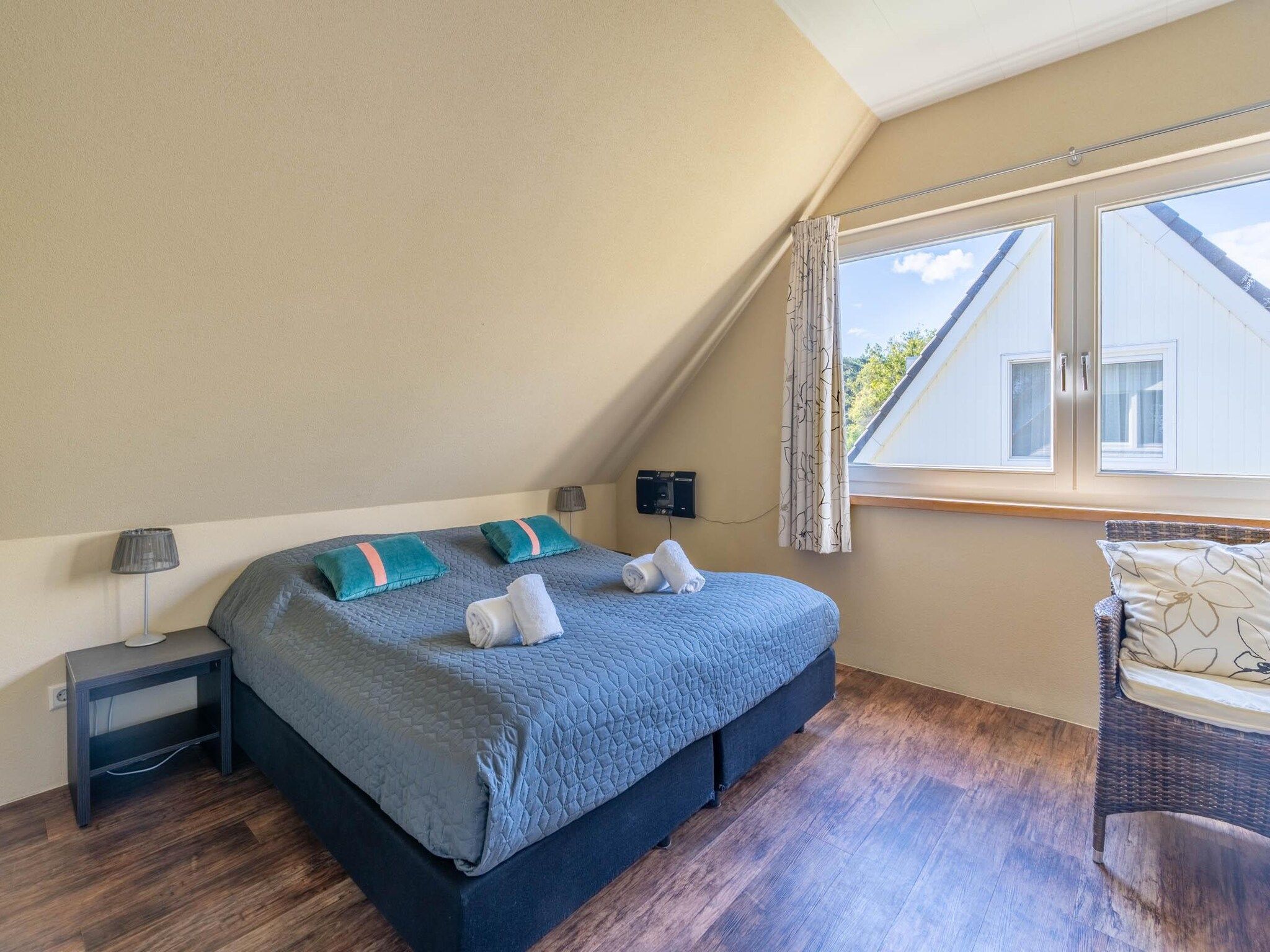 Een slaapkamer van Tempelierweg 22 in Den Burg