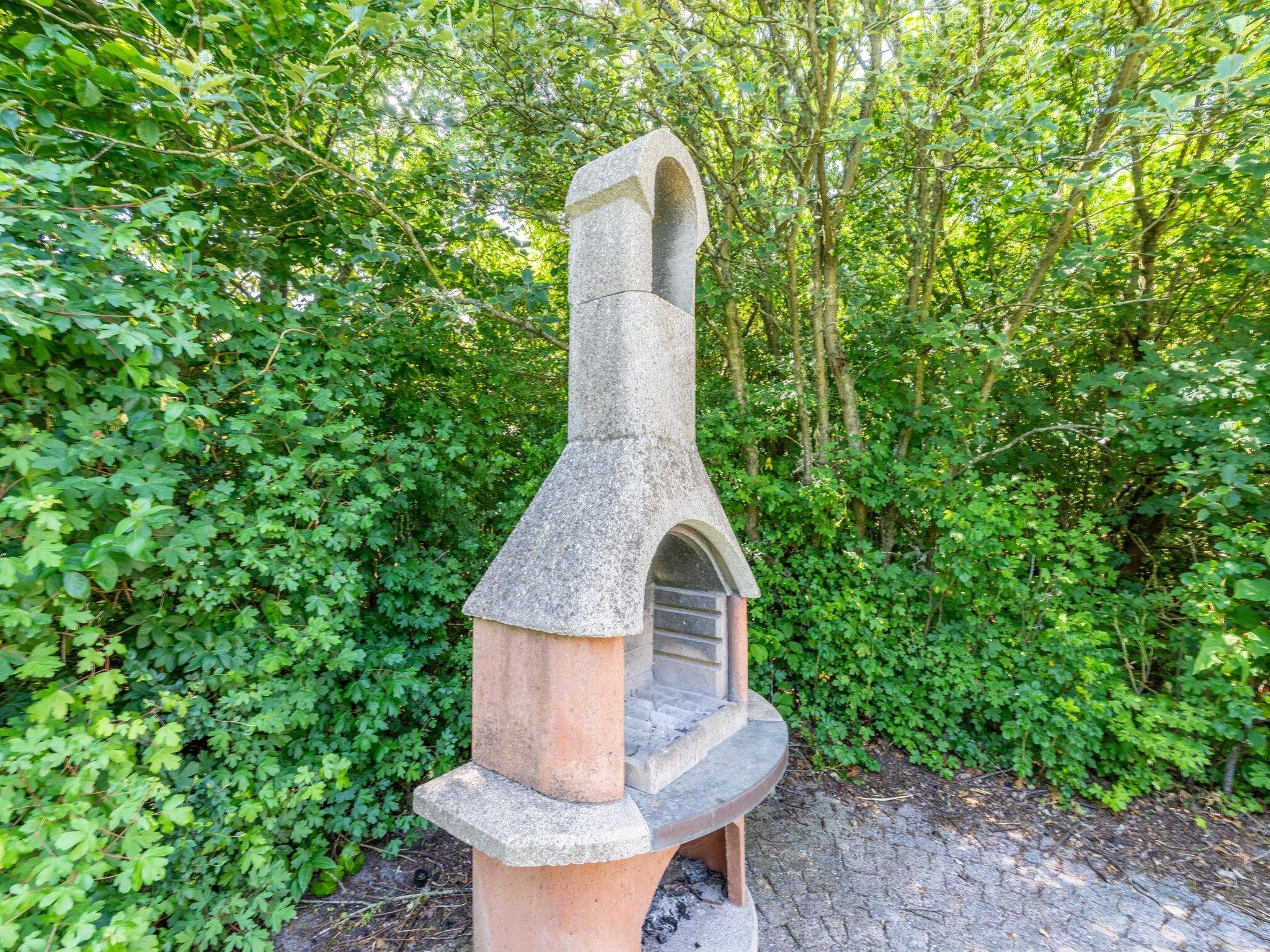 De tuin van Kamperfoelie 95 in De Koog