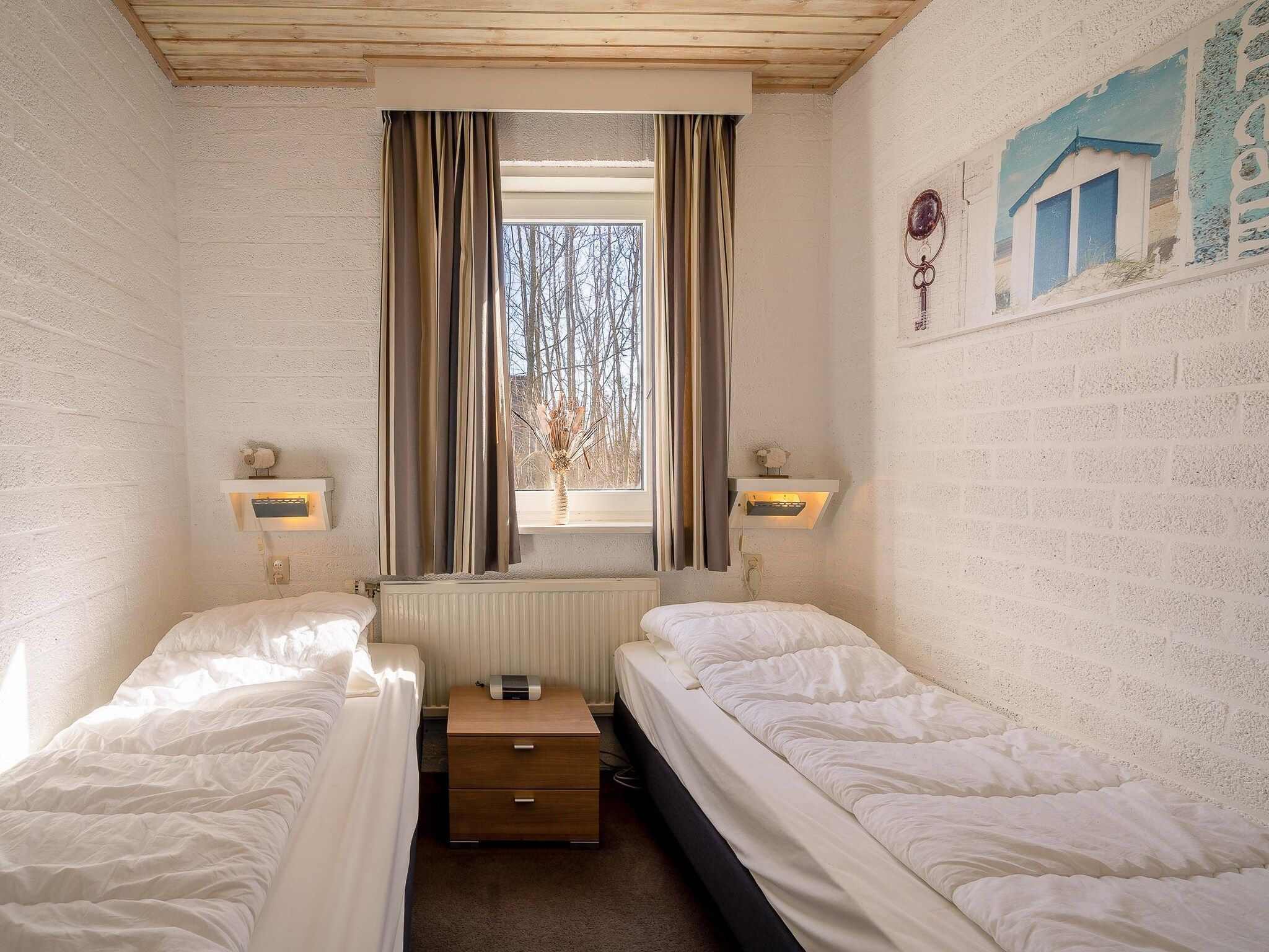 Een slaapkamer van Hoogelandt 92 in De Koog