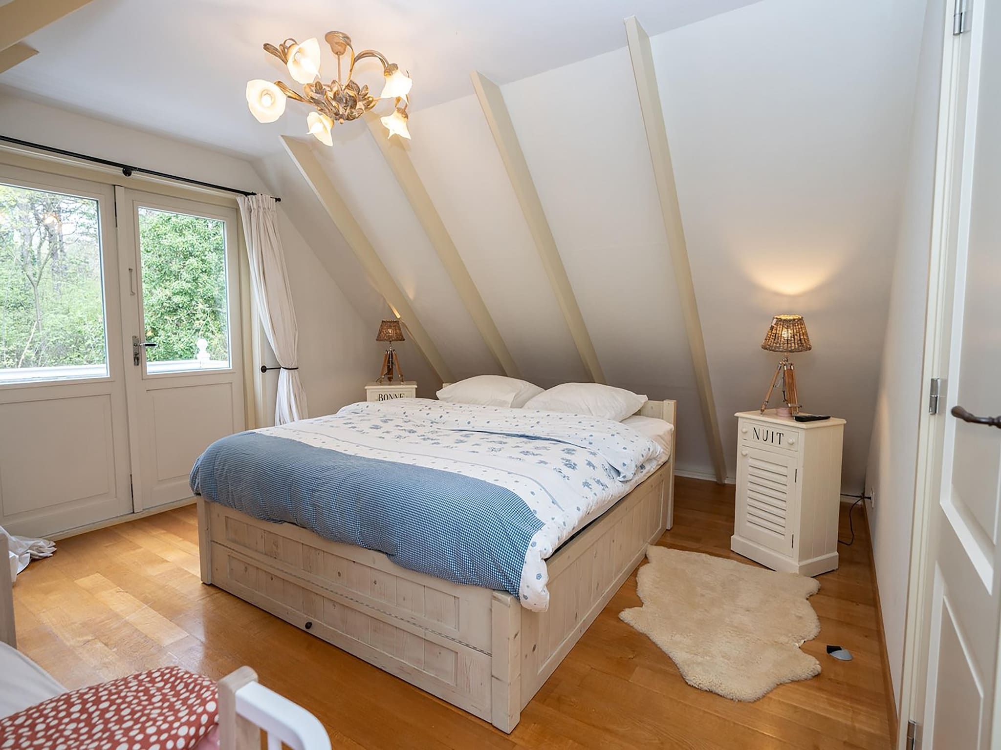 Een slaapkamer van Bosrandweg 496 in De Koog