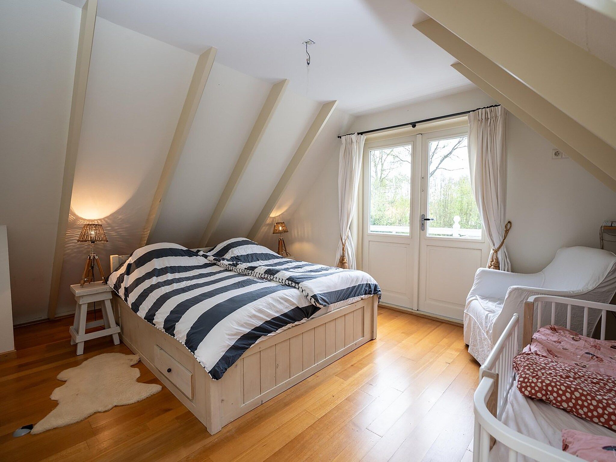 Een slaapkamer van Bosrandweg 496 in De Koog