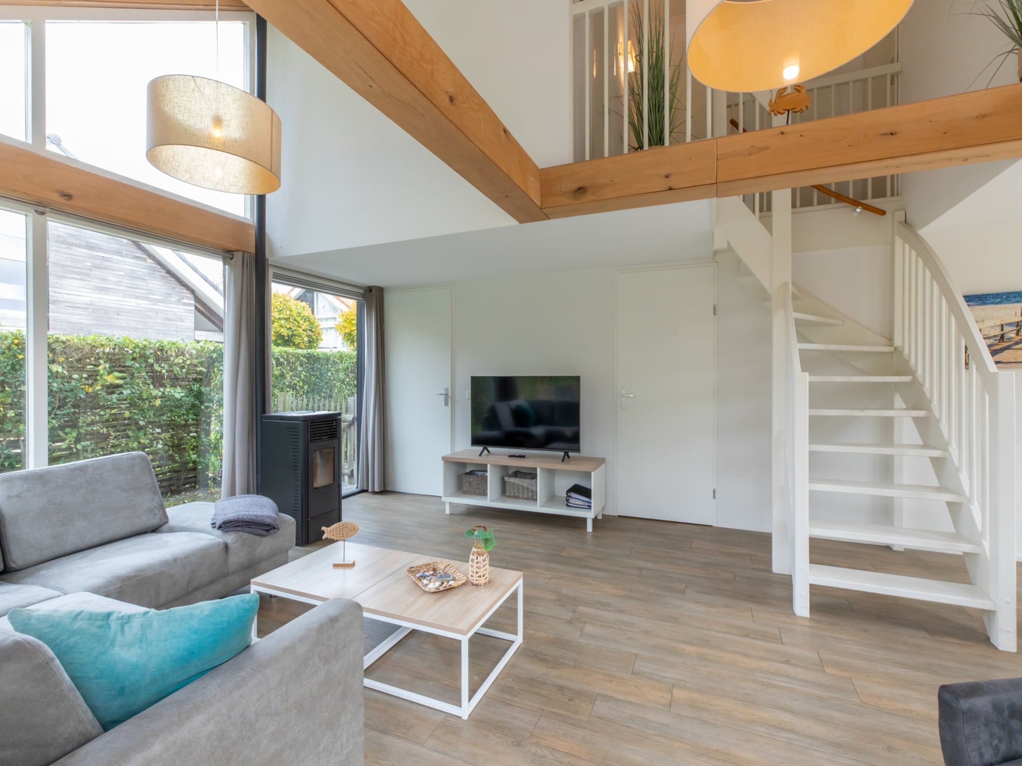 De woonkamer van Zonnedorp 21  Beach Villa Joya Renesse | Luxury Beach Villa with Sauna in Renesse
