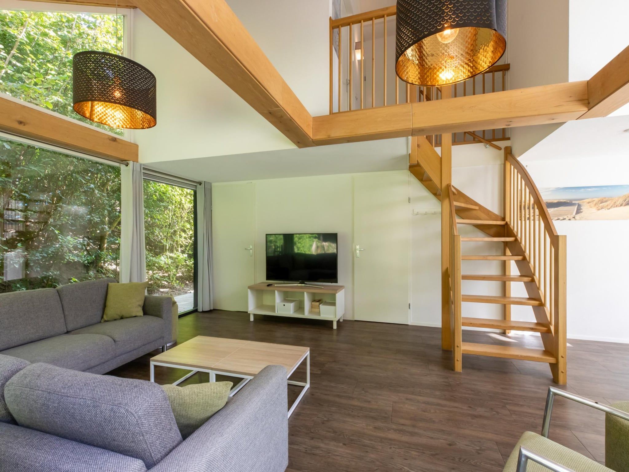 De woonkamer van Zonnedorp 23 Zeeland Huis Renesse: Luxury Beach Holiday | Close to North Sea in Renesse