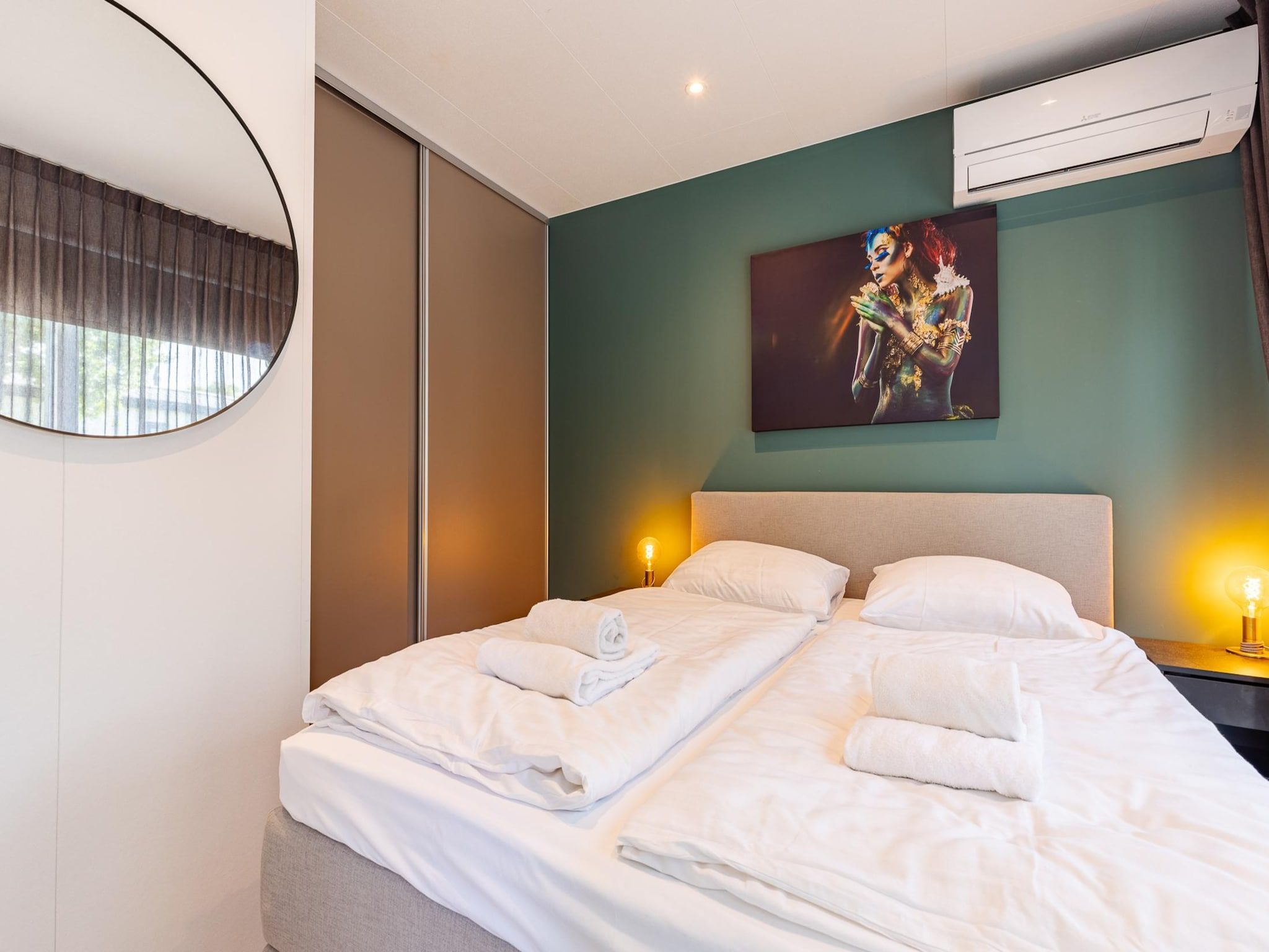Een slaapkamer van Chalet Julianahoeve | Beachhouse Renesse 2645 in Renesse