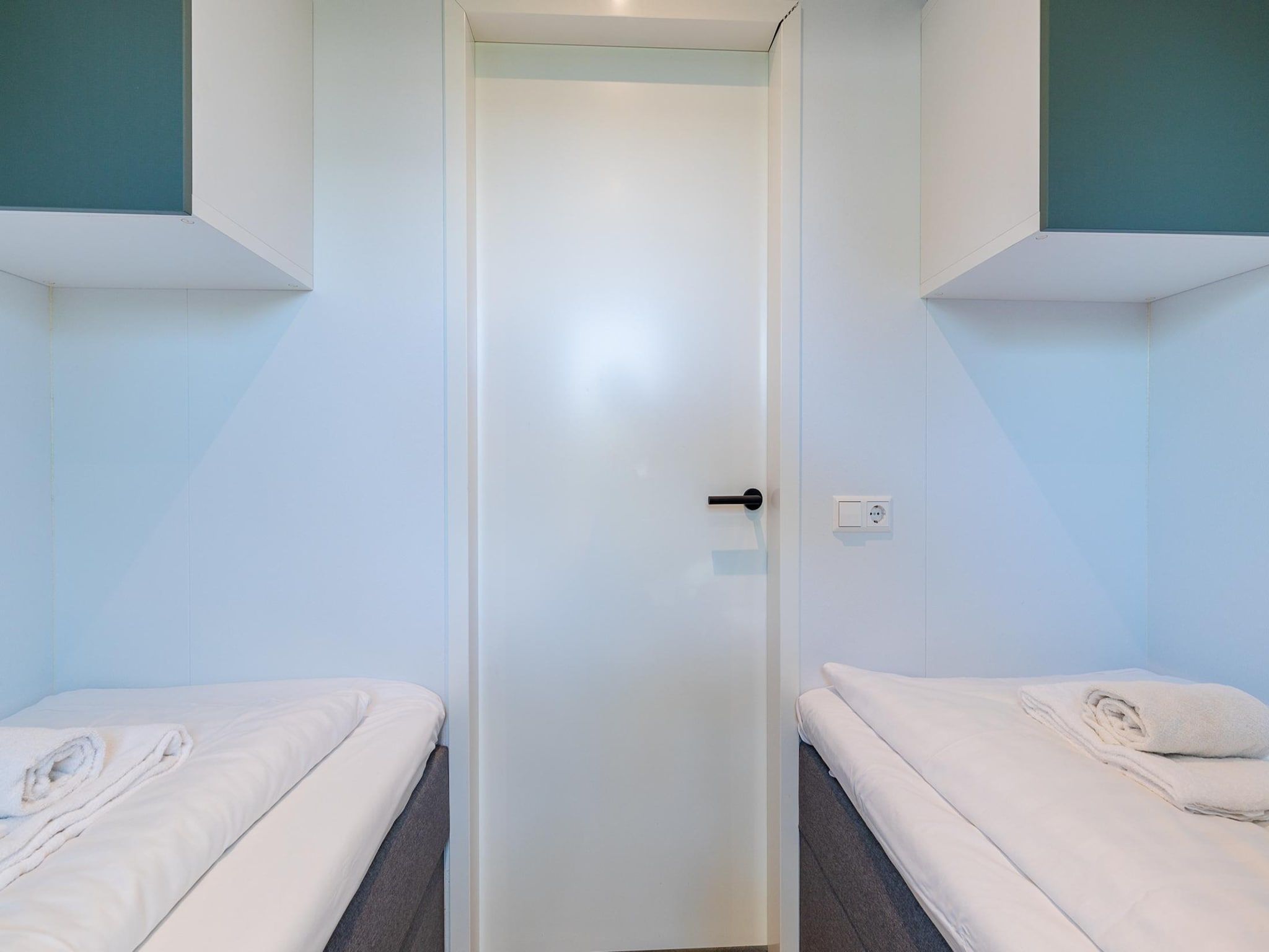 Een slaapkamer van Chalet Julianahoeve | Beachhouse Renesse 2645 in Renesse