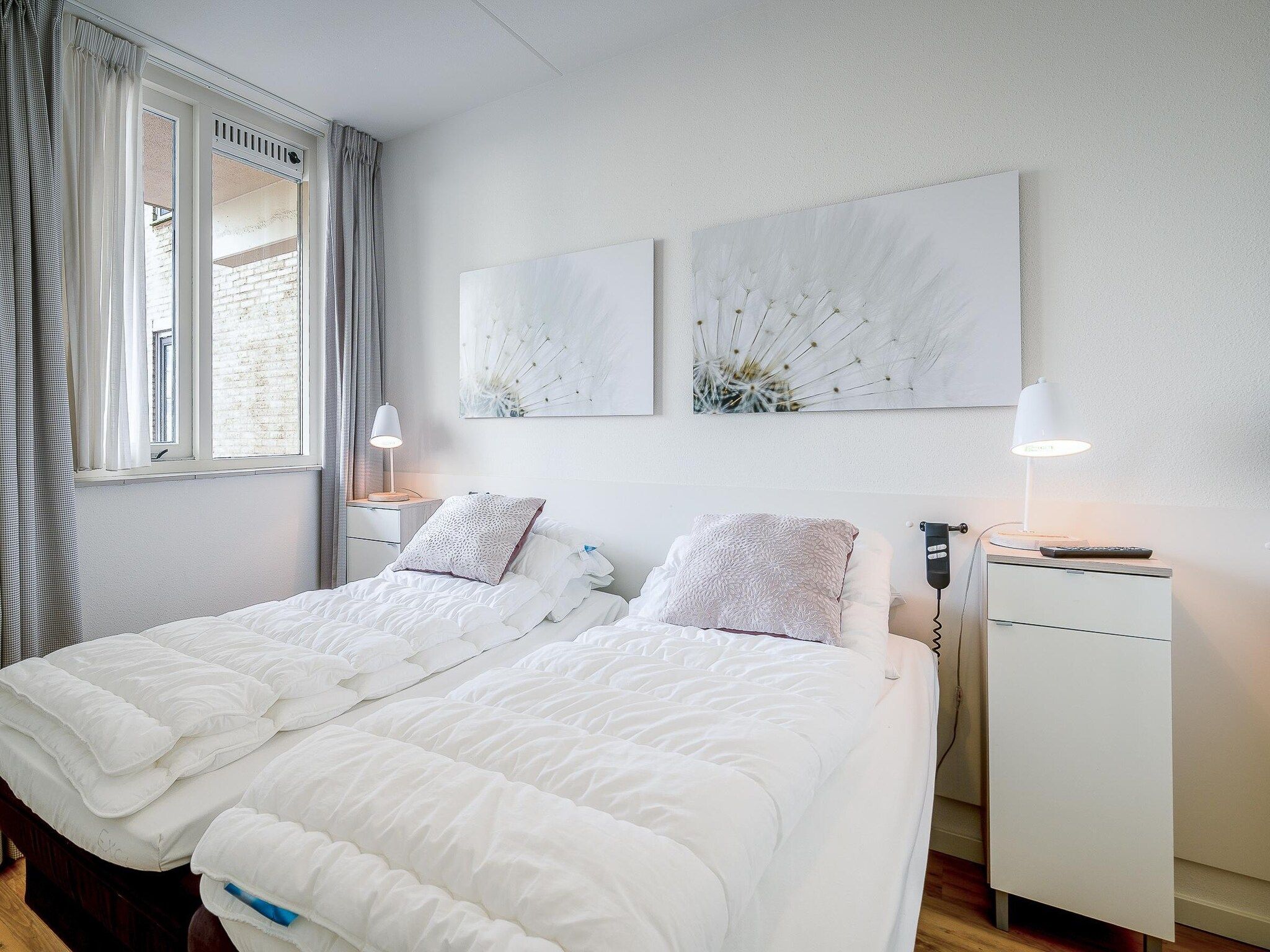 Een slaapkamer van Juliana 042 in De Koog