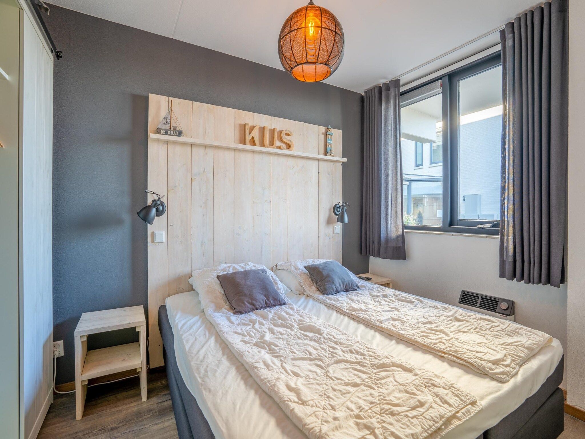 Een slaapkamer van Juliana 048 in De Koog
