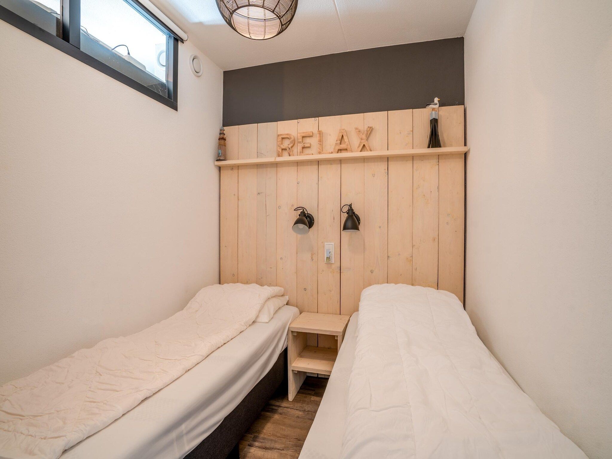Een slaapkamer van Juliana 048 in De Koog